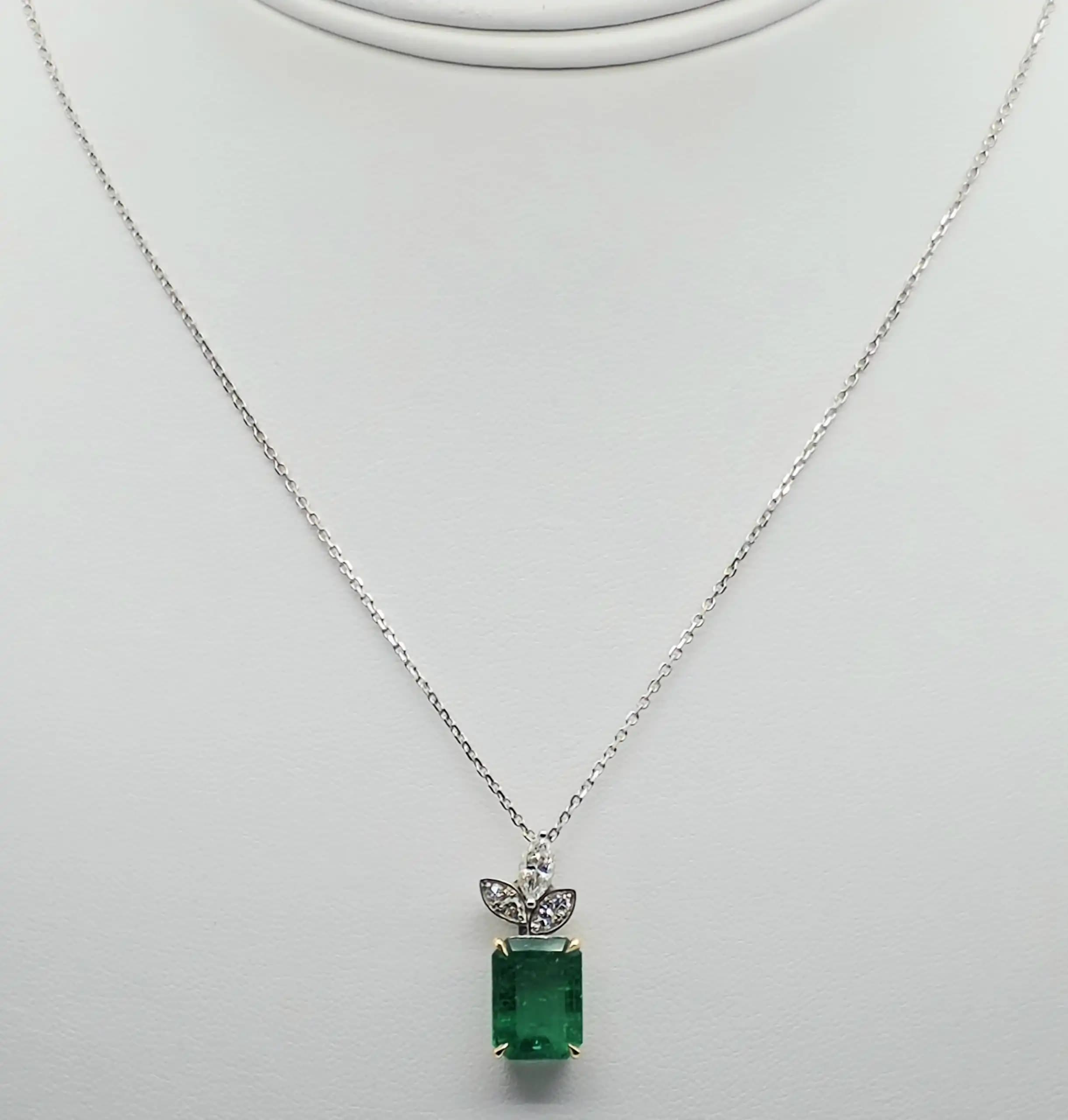 2.48 cts emerald cut natural emerald and diamond pendant in 18K white gold
