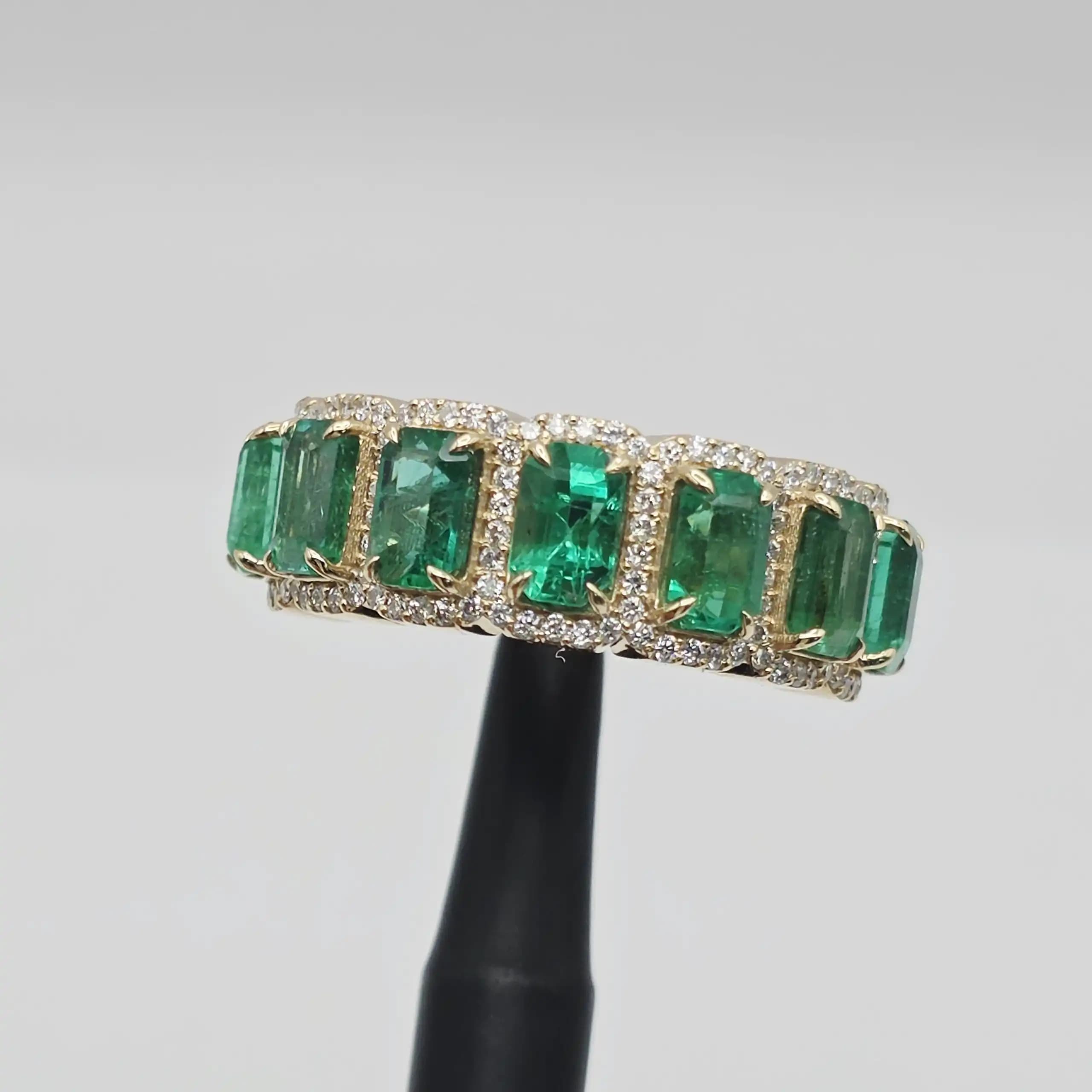 3.68 cts emerald cut natural emerald half eternity ring in 14K yellow gold