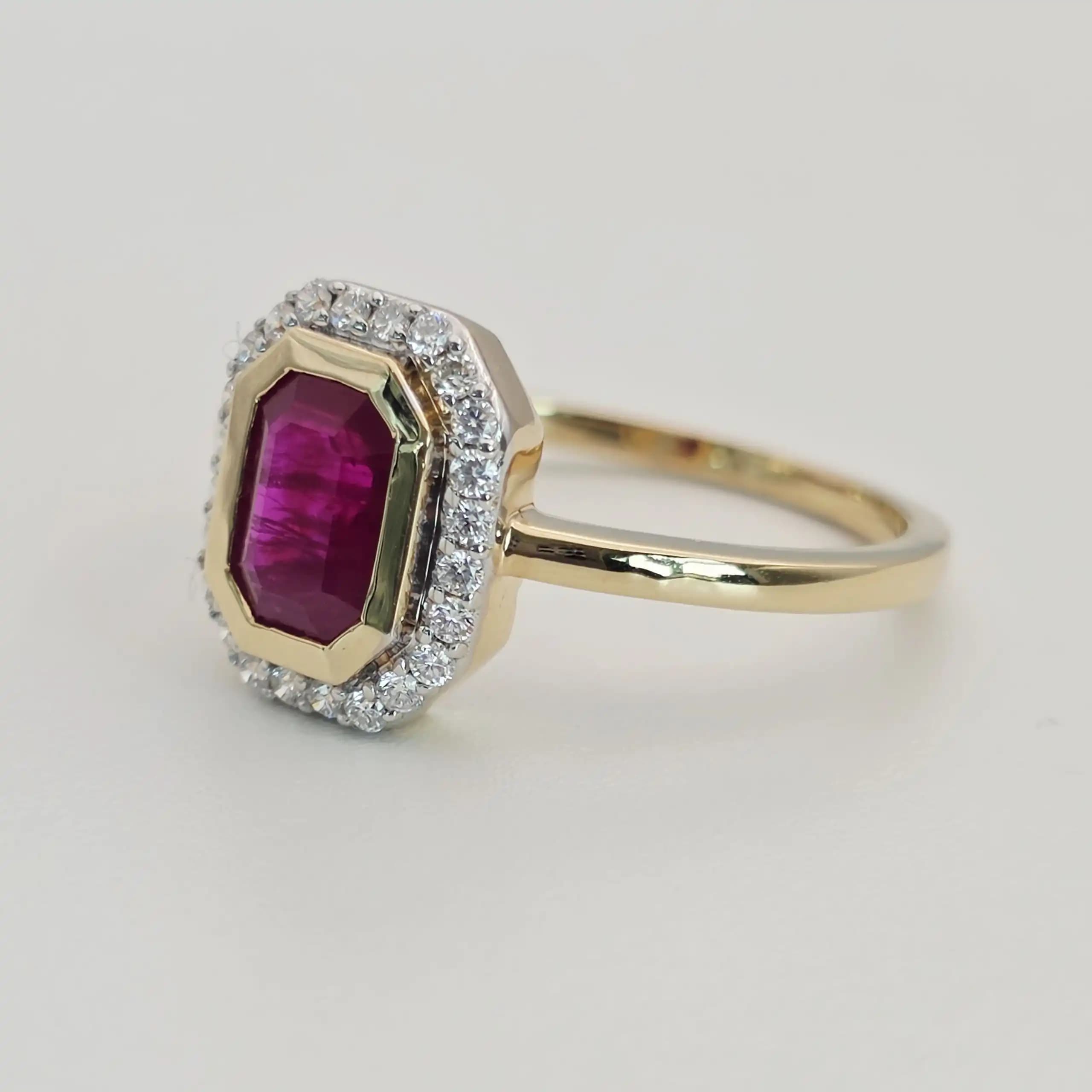 1.11 cts emerald cut natural ruby halo ring in 18K yellow gold
