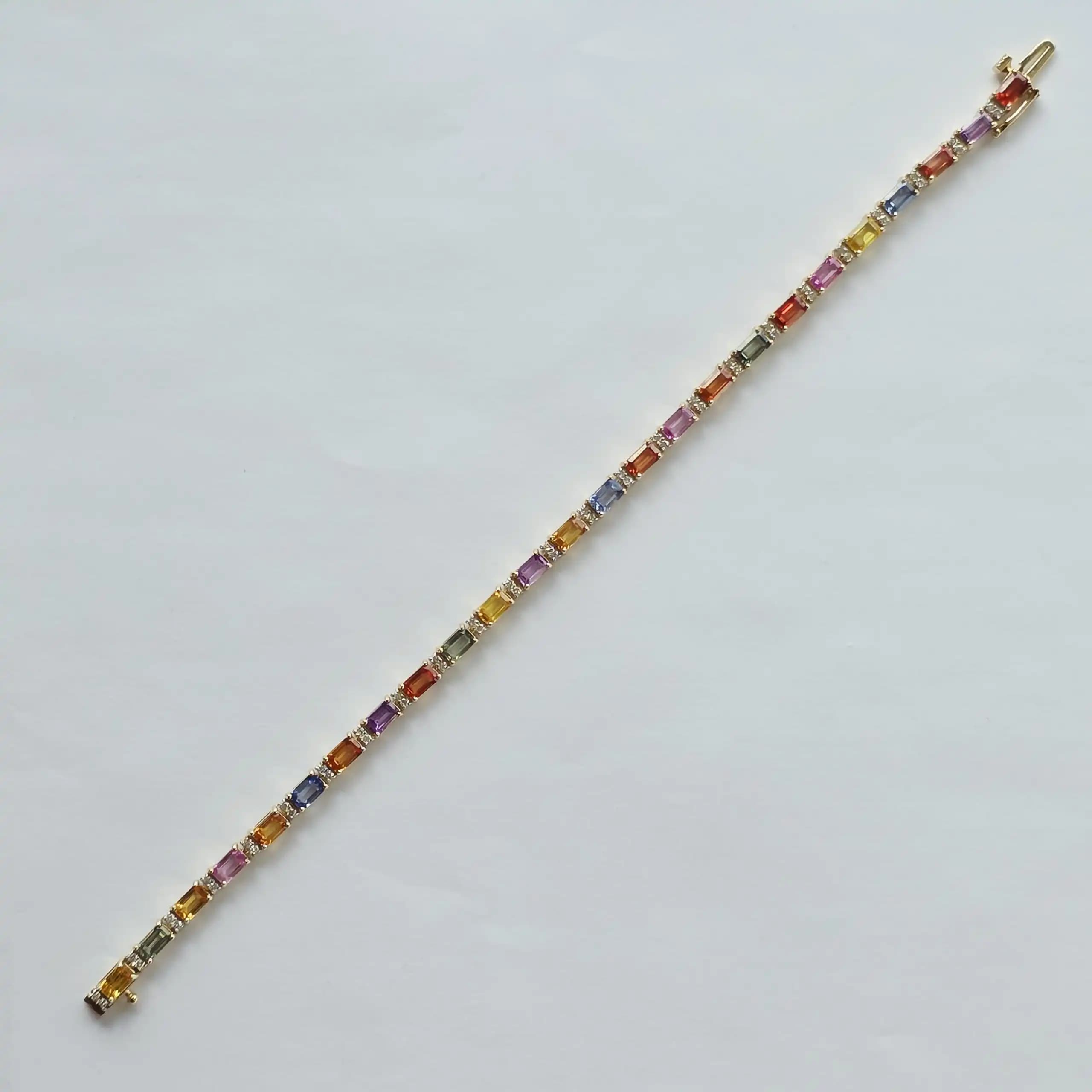 12.24 cts multi colour natural sapphire tennis bracelet in 14K yellow gold