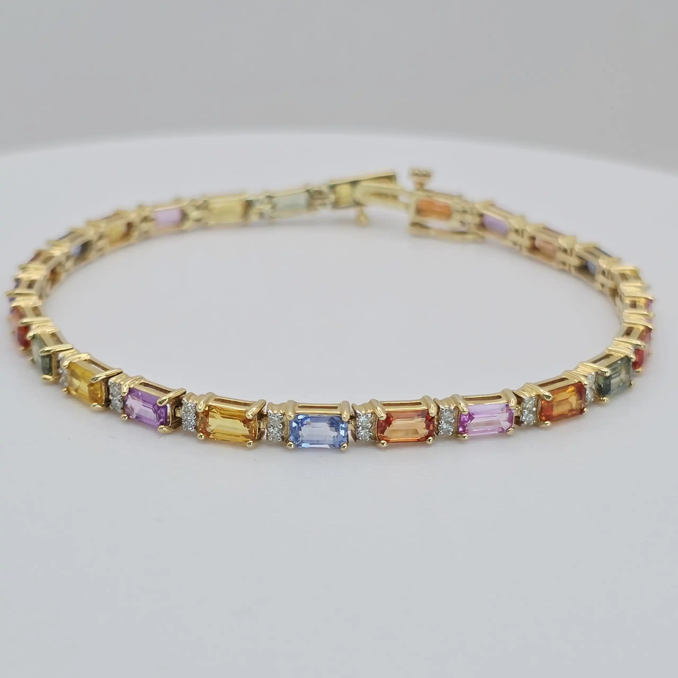 12.24 cts multi colour natural sapphire tennis bracelet in 14K yellow gold