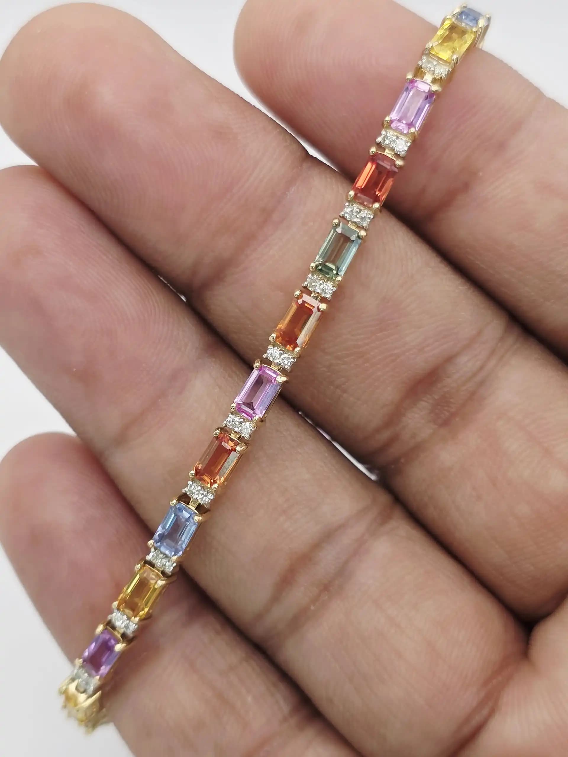 12.24 cts multi colour natural sapphire tennis bracelet in 14K yellow gold