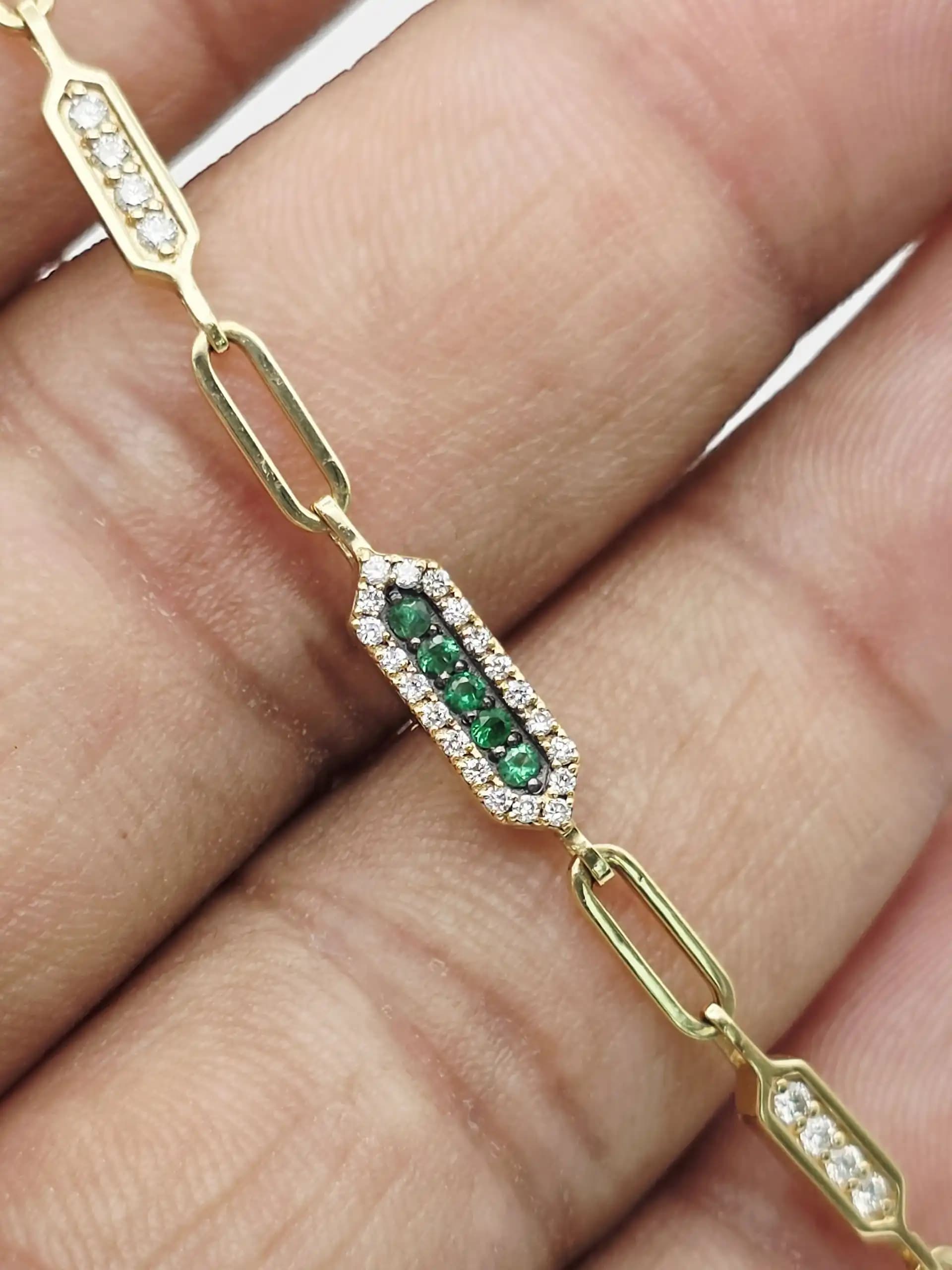 0.06 cts round natural emerald and diamond link bracelet in 18K yellow gold
