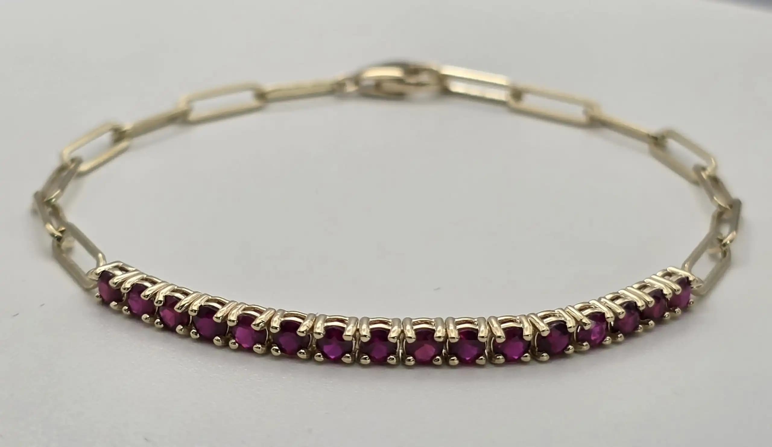 1.60 cts round natural ruby tennis bracelet in 14K yellow gold