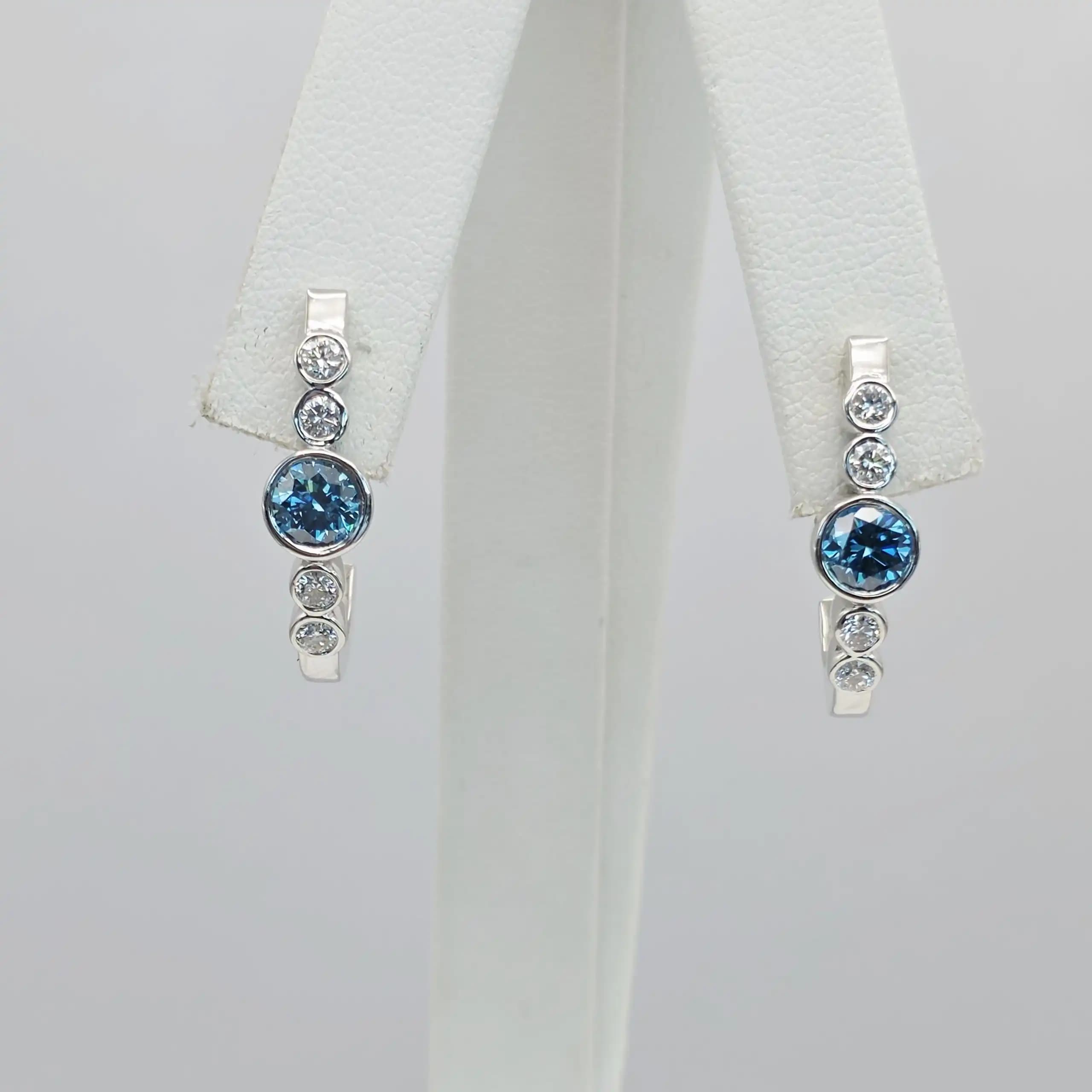 1.05 cts round natural blue diamond curved hoop earrings in 14K white gold