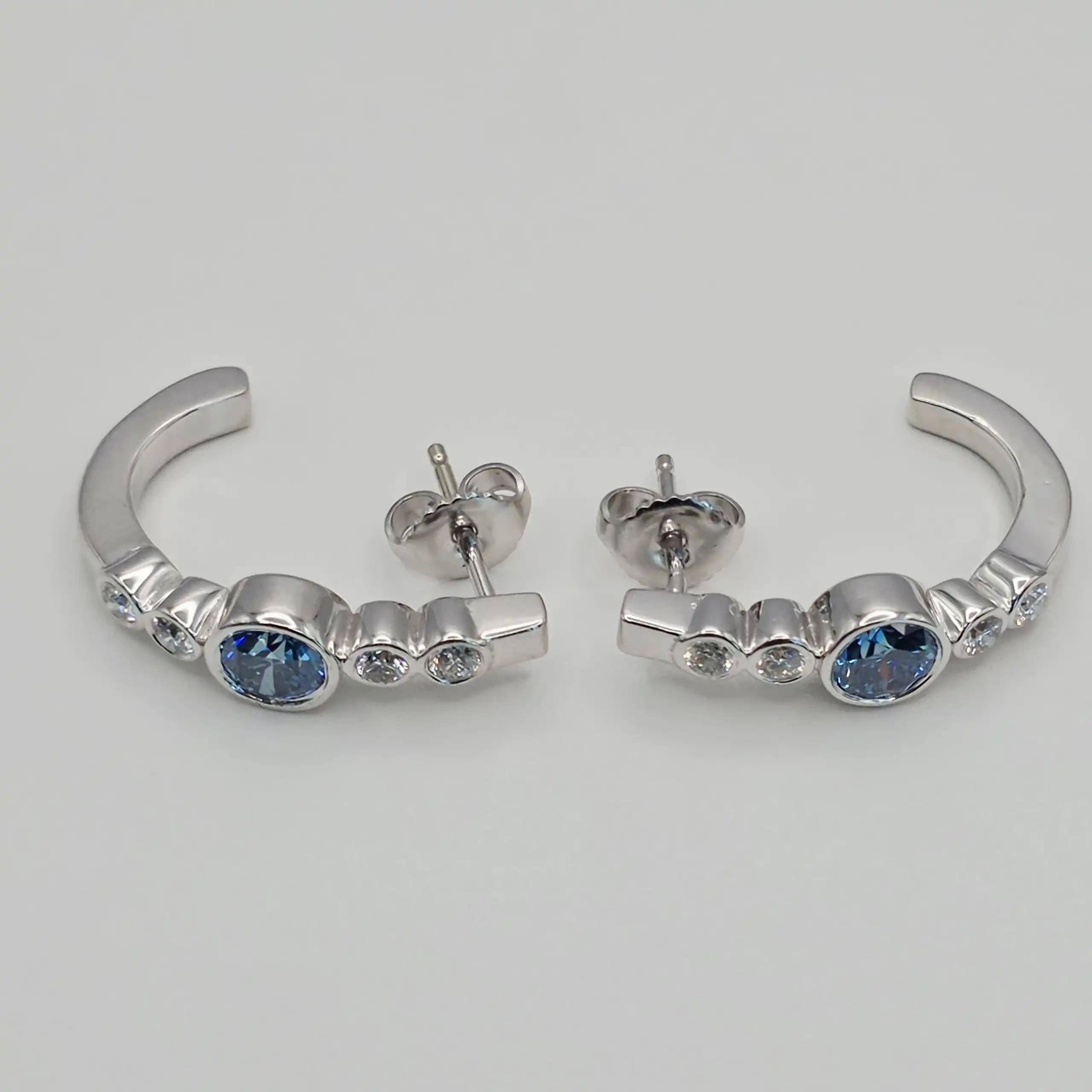 1.05 cts round natural blue diamond curved hoop earrings in 14K white gold
