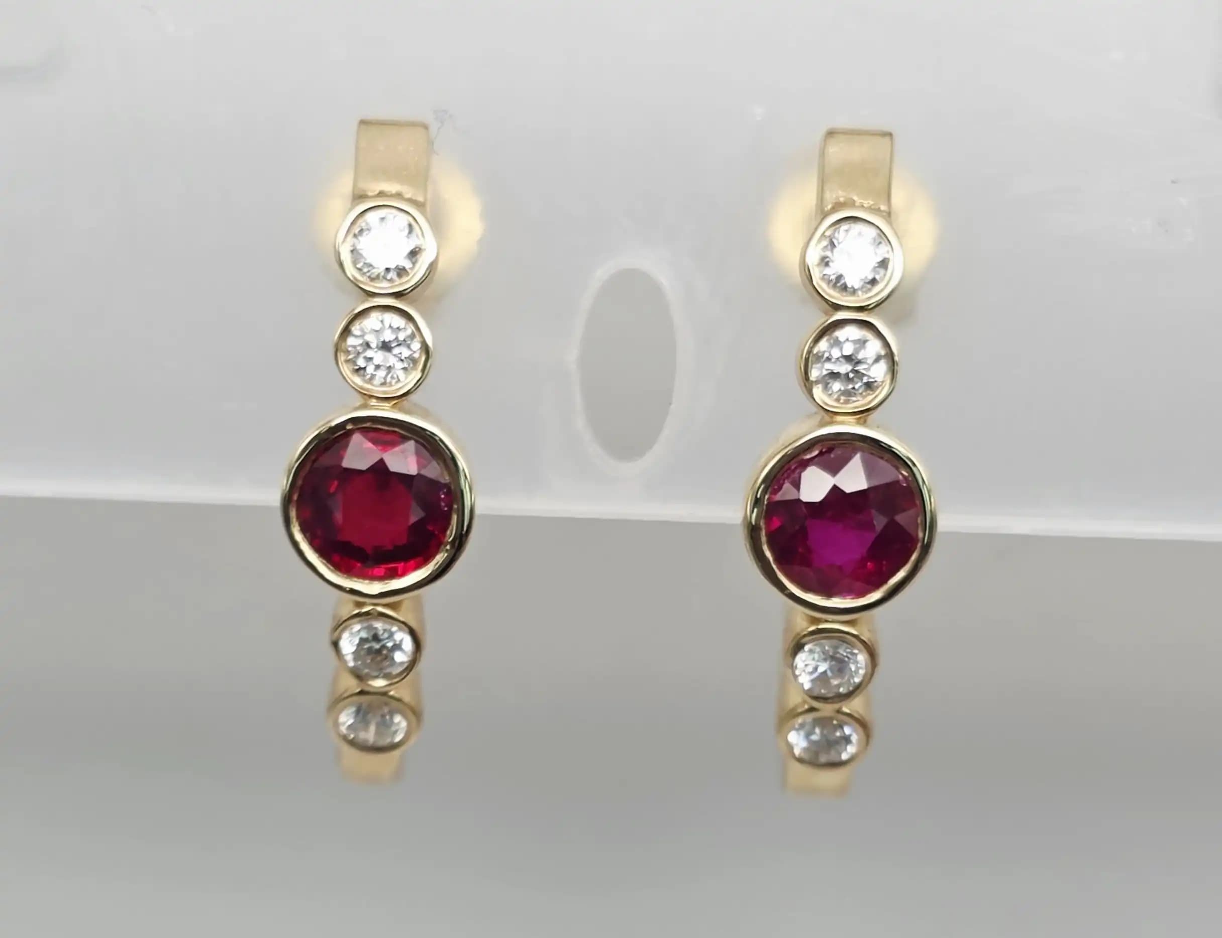 1.12 cts round natural ruby and diamond curved hoop earrings in 14K yellow gold