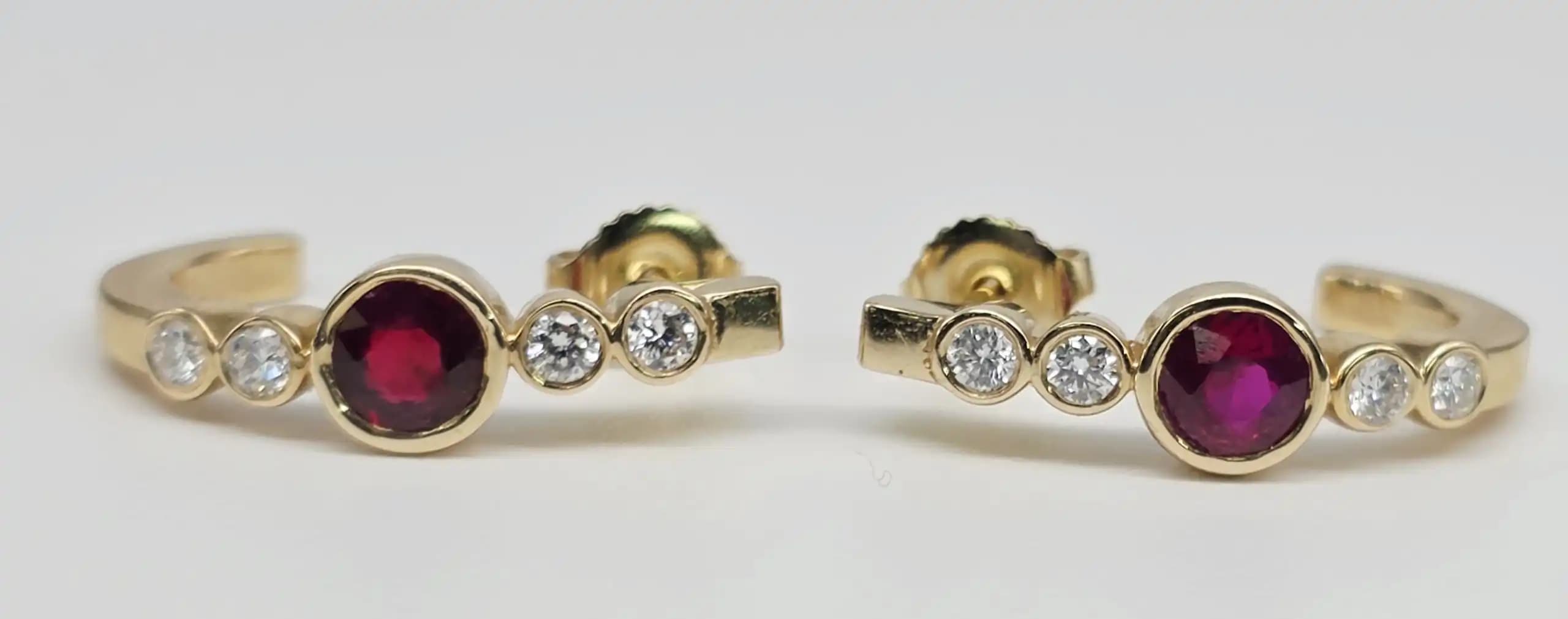 1.12 cts round natural ruby and diamond curved hoop earrings in 14K yellow gold