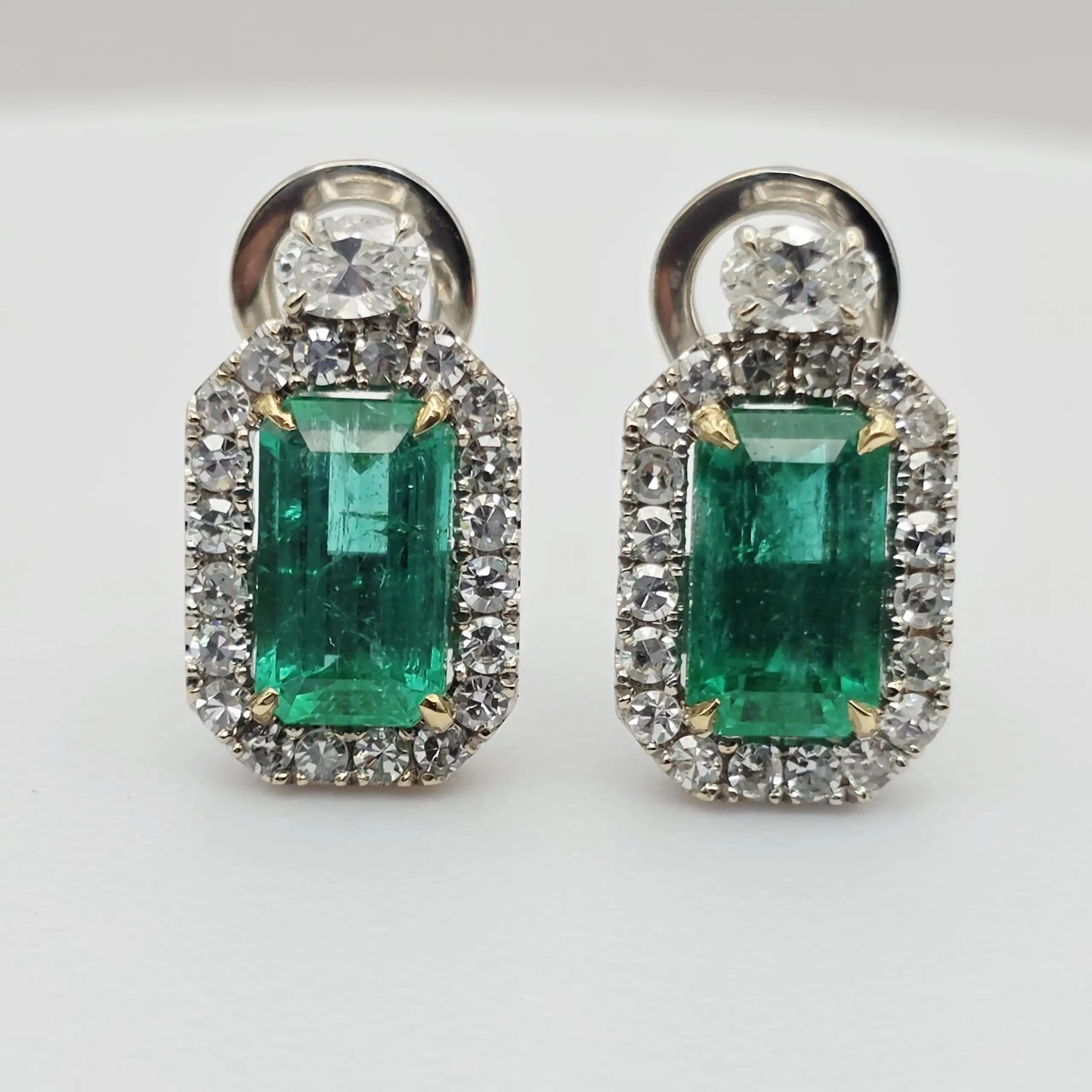 5.00 cts emerald cut natural emerald and diamond halo earrings in 18K white gold