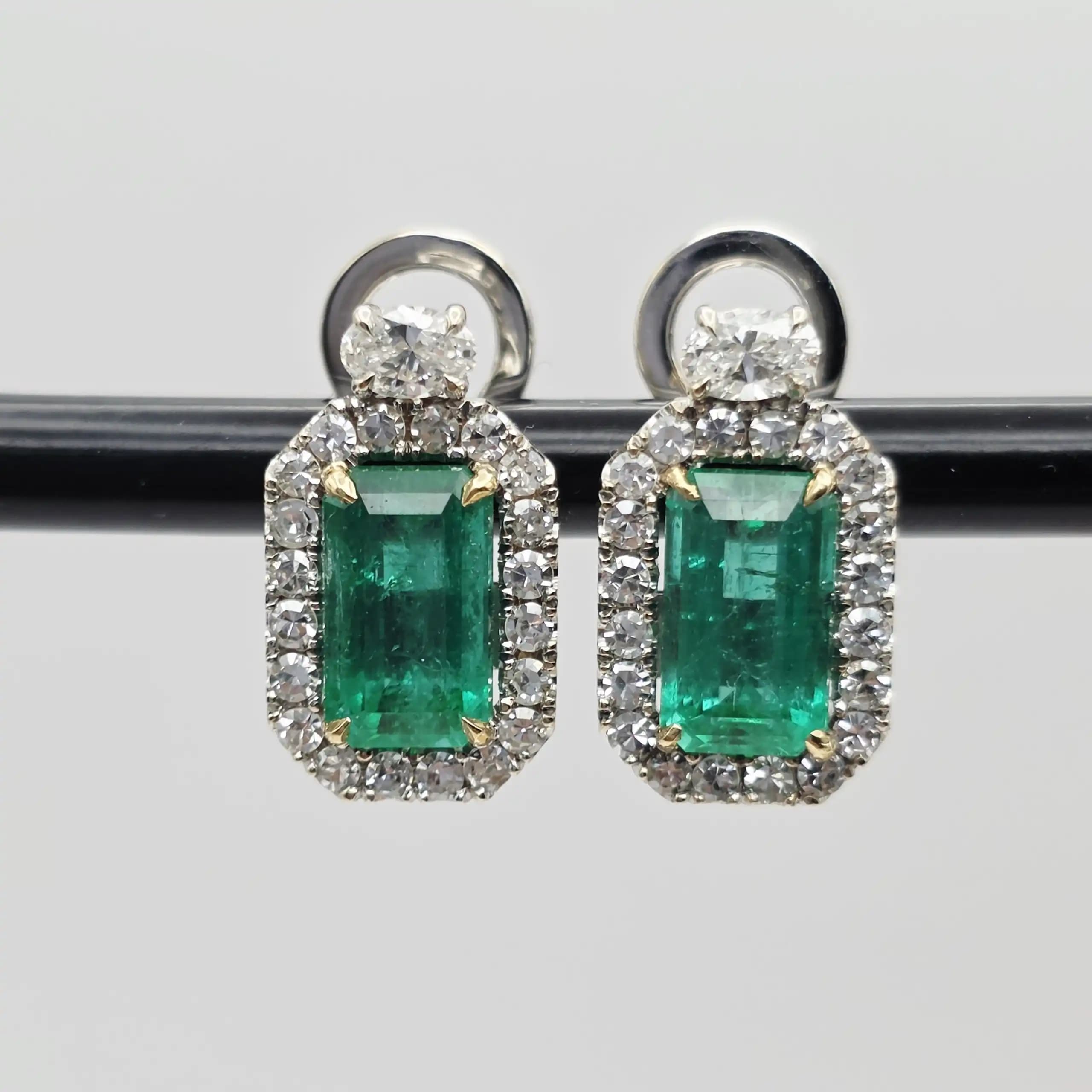 5.00 cts emerald cut natural emerald and diamond halo earrings in 18K white gold