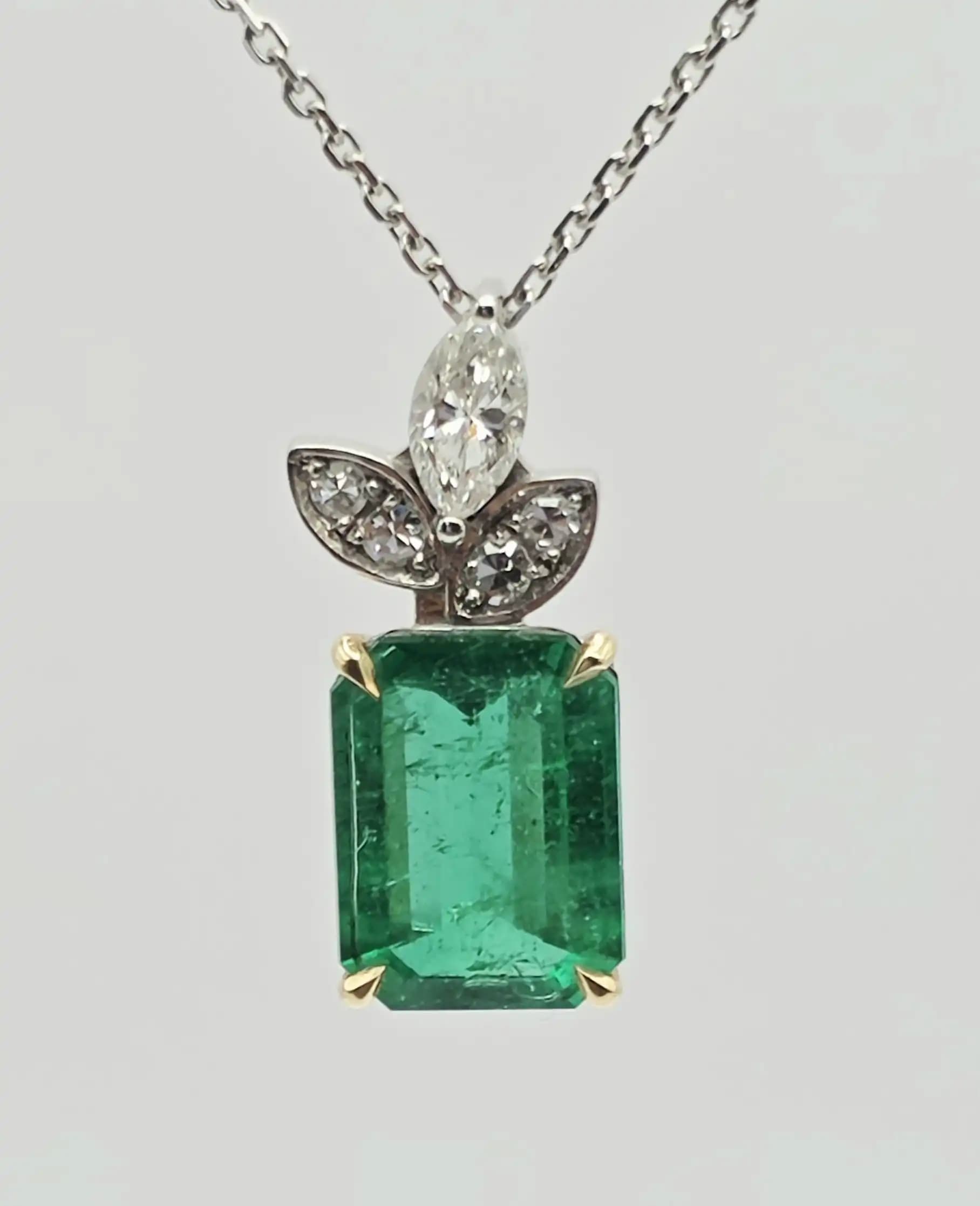 2.48 cts emerald cut natural emerald and diamond pendant in 18K white gold