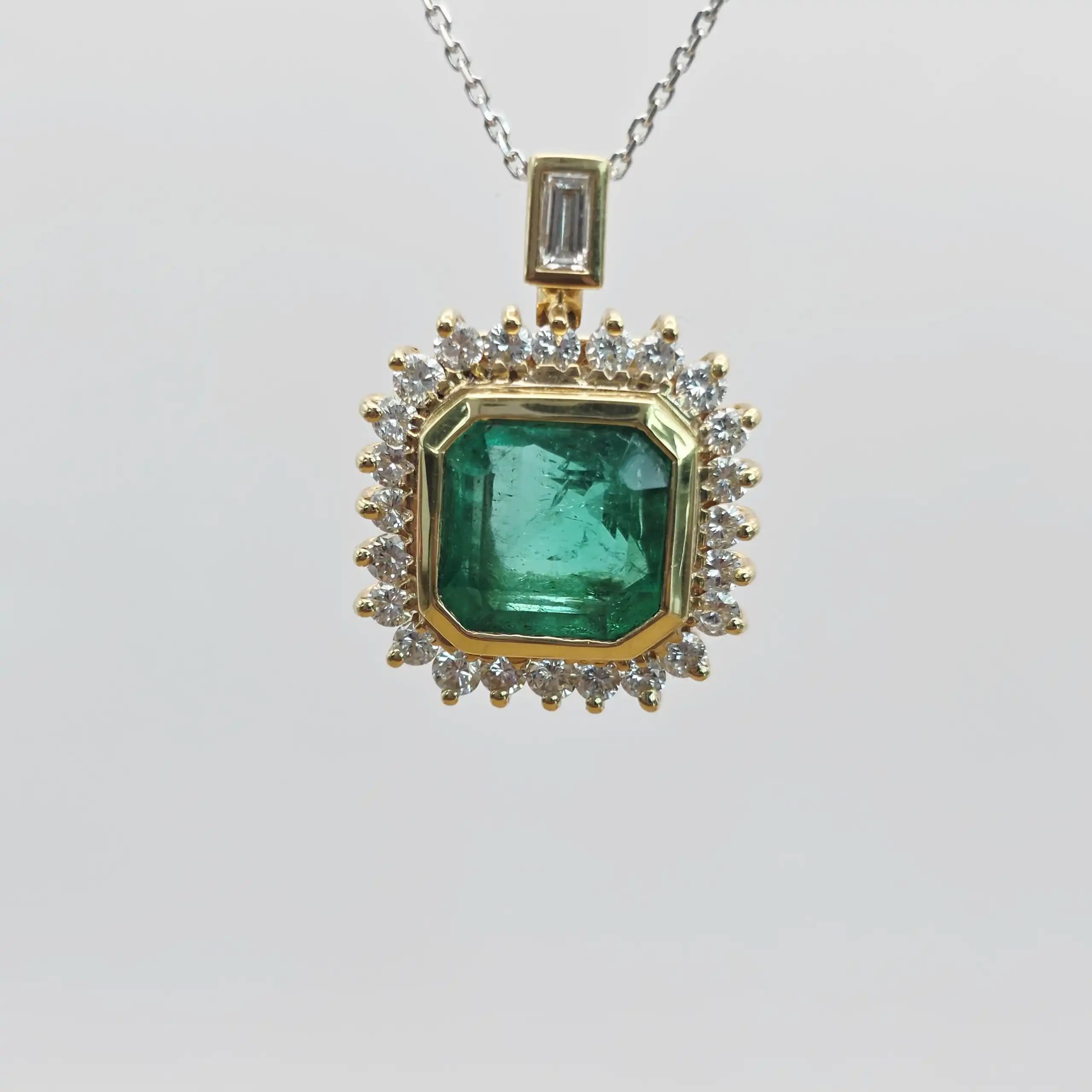 5.00 cts emerald cut natural emerald and diamond halo pendant in 18K yellow gold