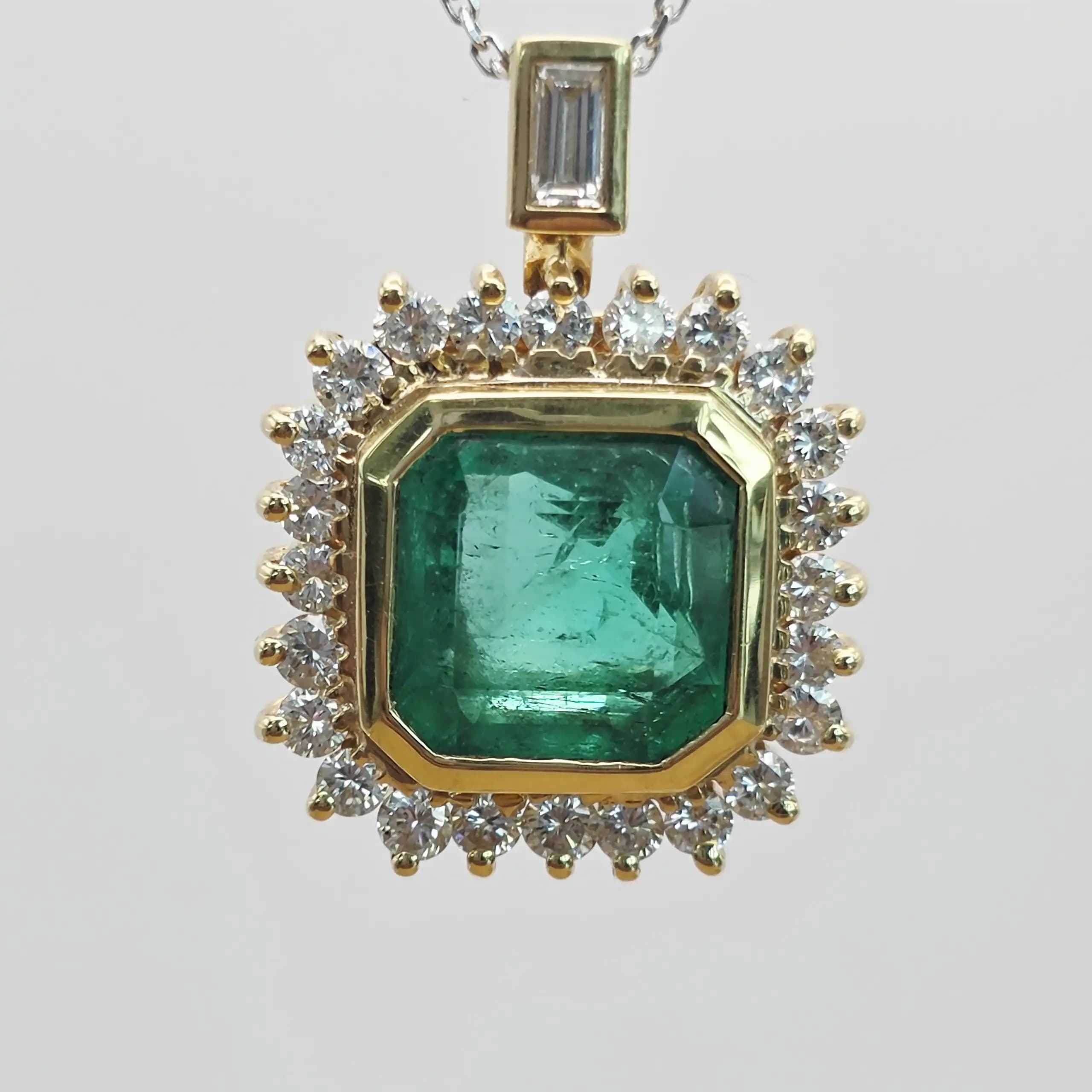 5.00 cts emerald cut natural emerald and diamond halo pendant in 18K yellow gold