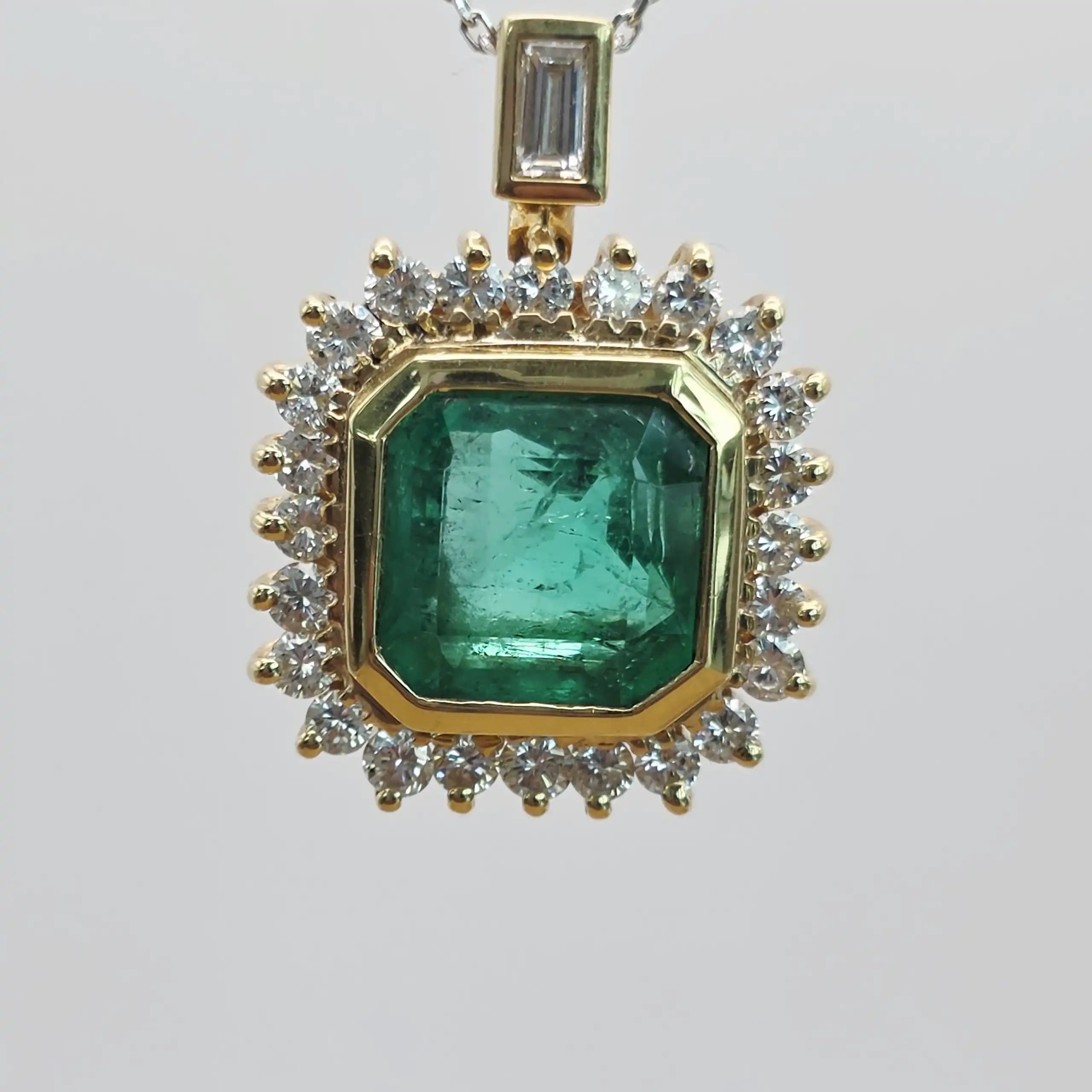 5.00 cts emerald cut natural emerald and diamond halo pendant in 18K yellow gold
