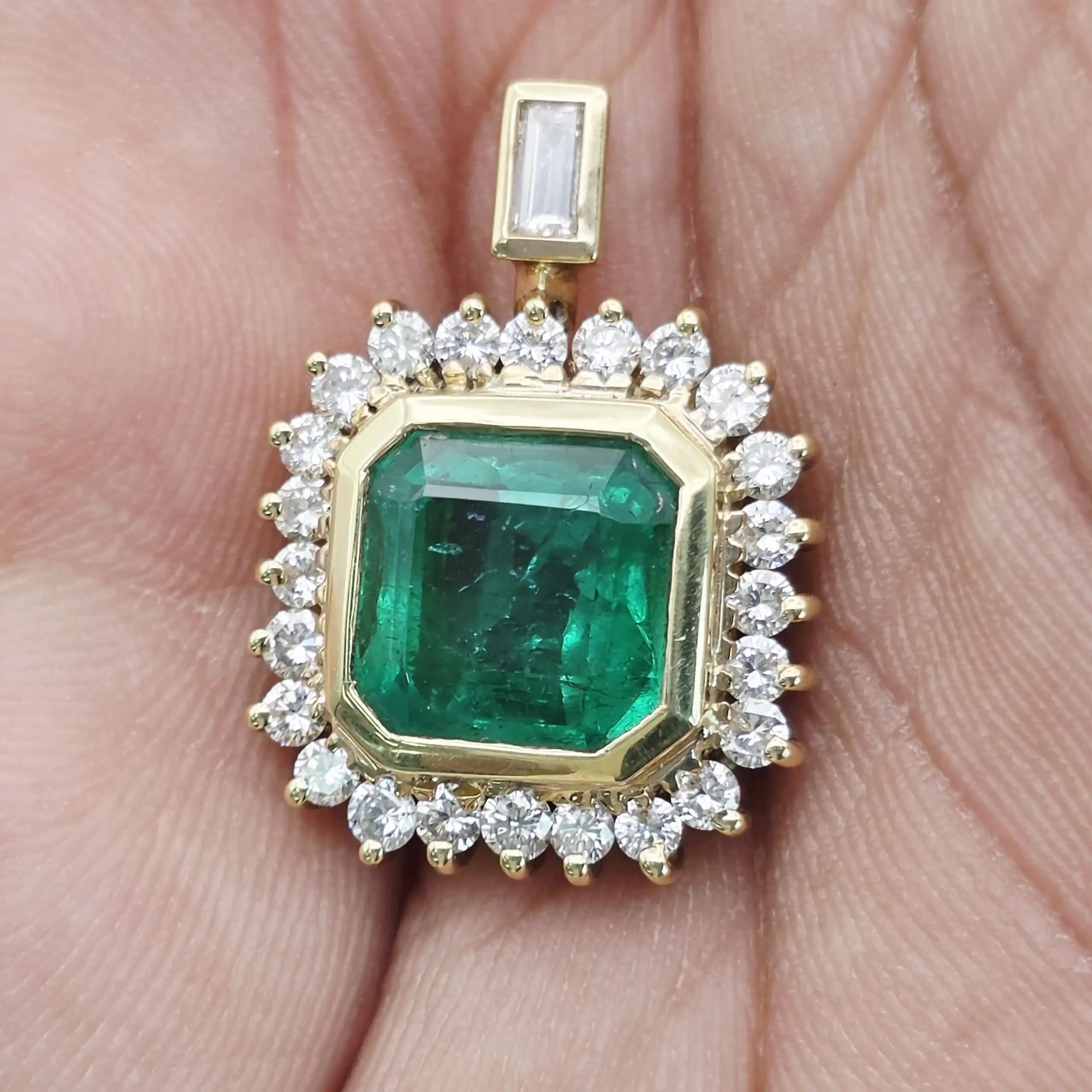5.00 cts emerald cut natural emerald and diamond halo pendant in 18K yellow gold