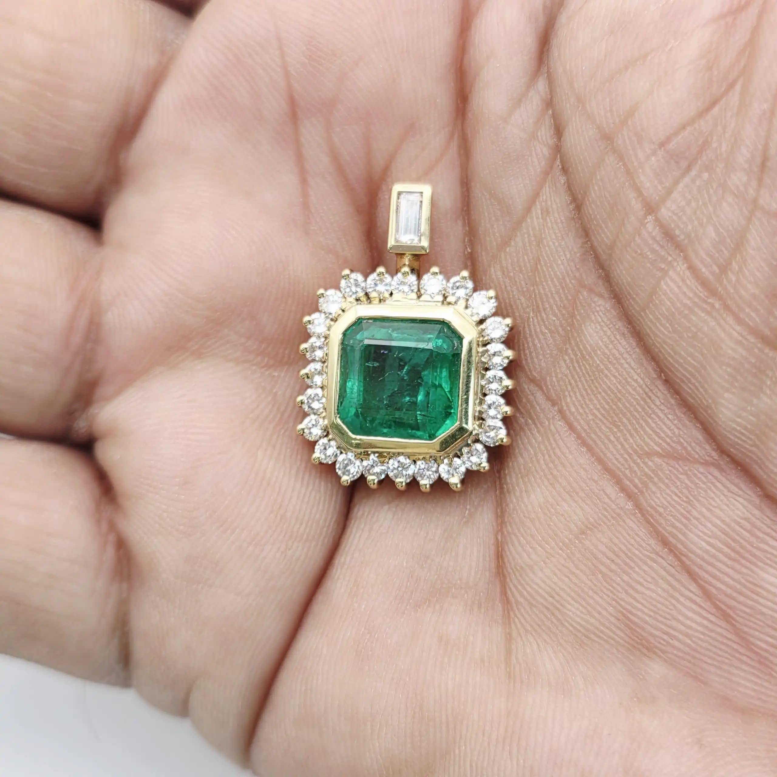 5.00 cts emerald cut natural emerald and diamond halo pendant in 18K yellow gold
