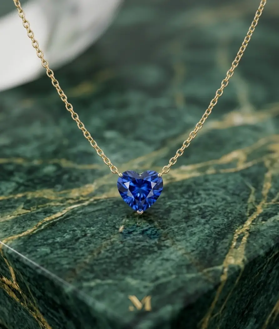 0.91 cts heart shape natural blue sapphire solitaire necklace in 14K gold