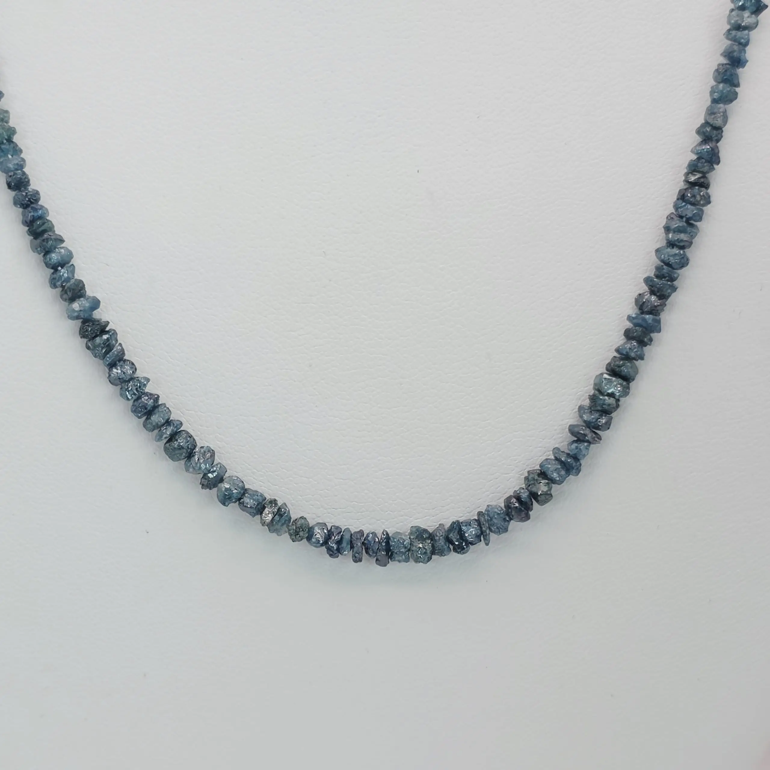 31.40 to 32.65 cts raw natural blue diamond chip necklace in 14K white gold