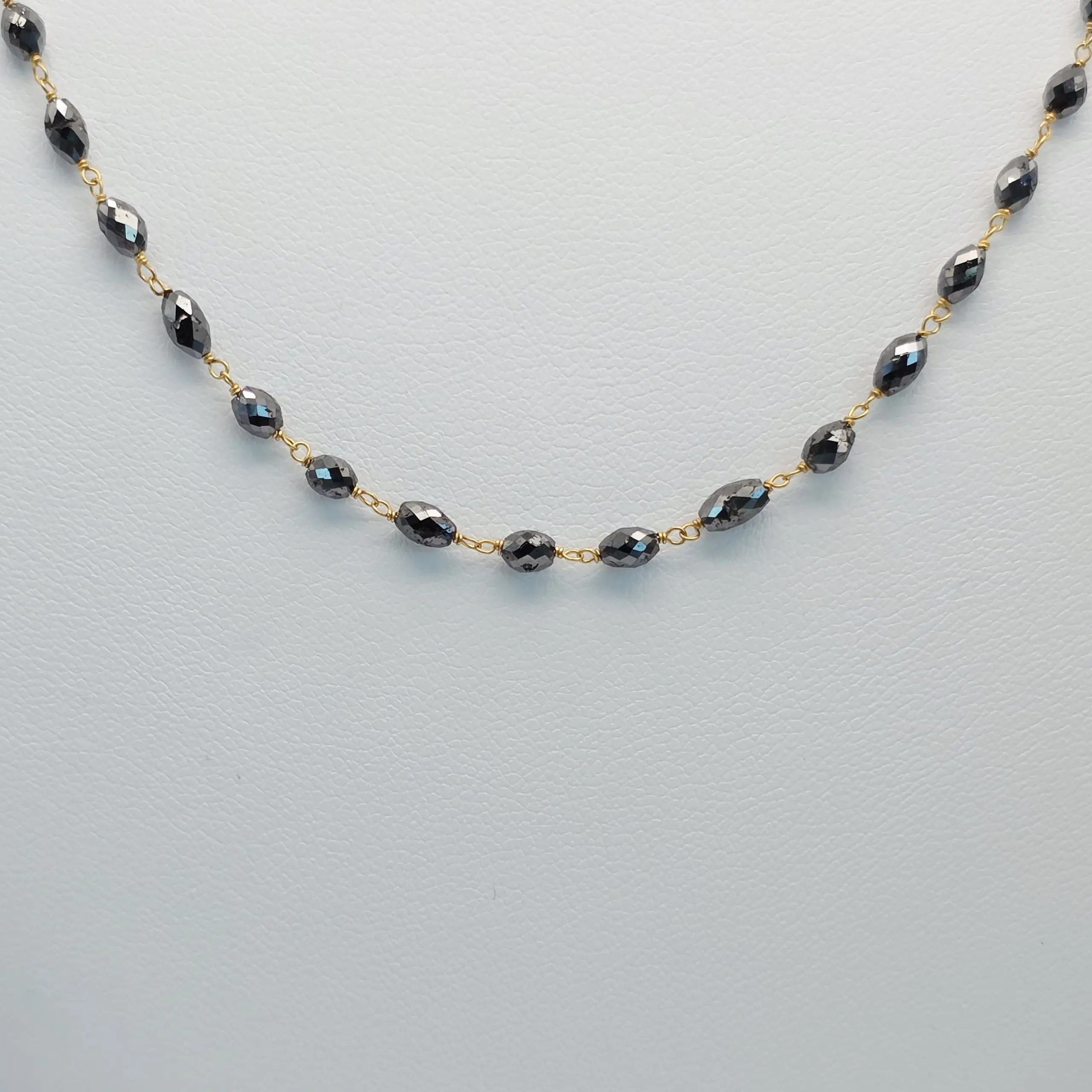 16.90 cts faceted natural black diamond marquise bead necklace in 14K yellow gold