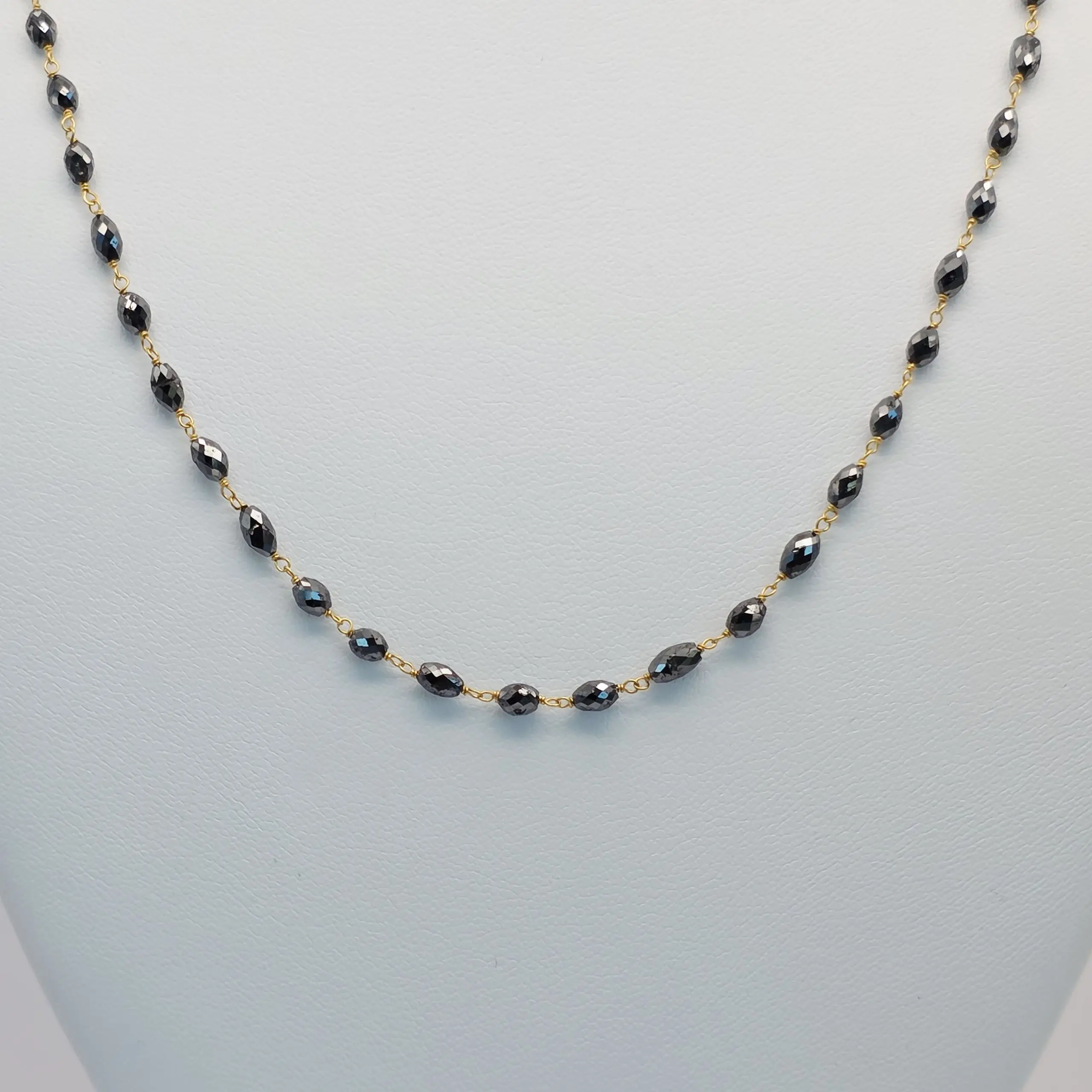 16.90 cts faceted natural black diamond marquise bead necklace in 14K yellow gold