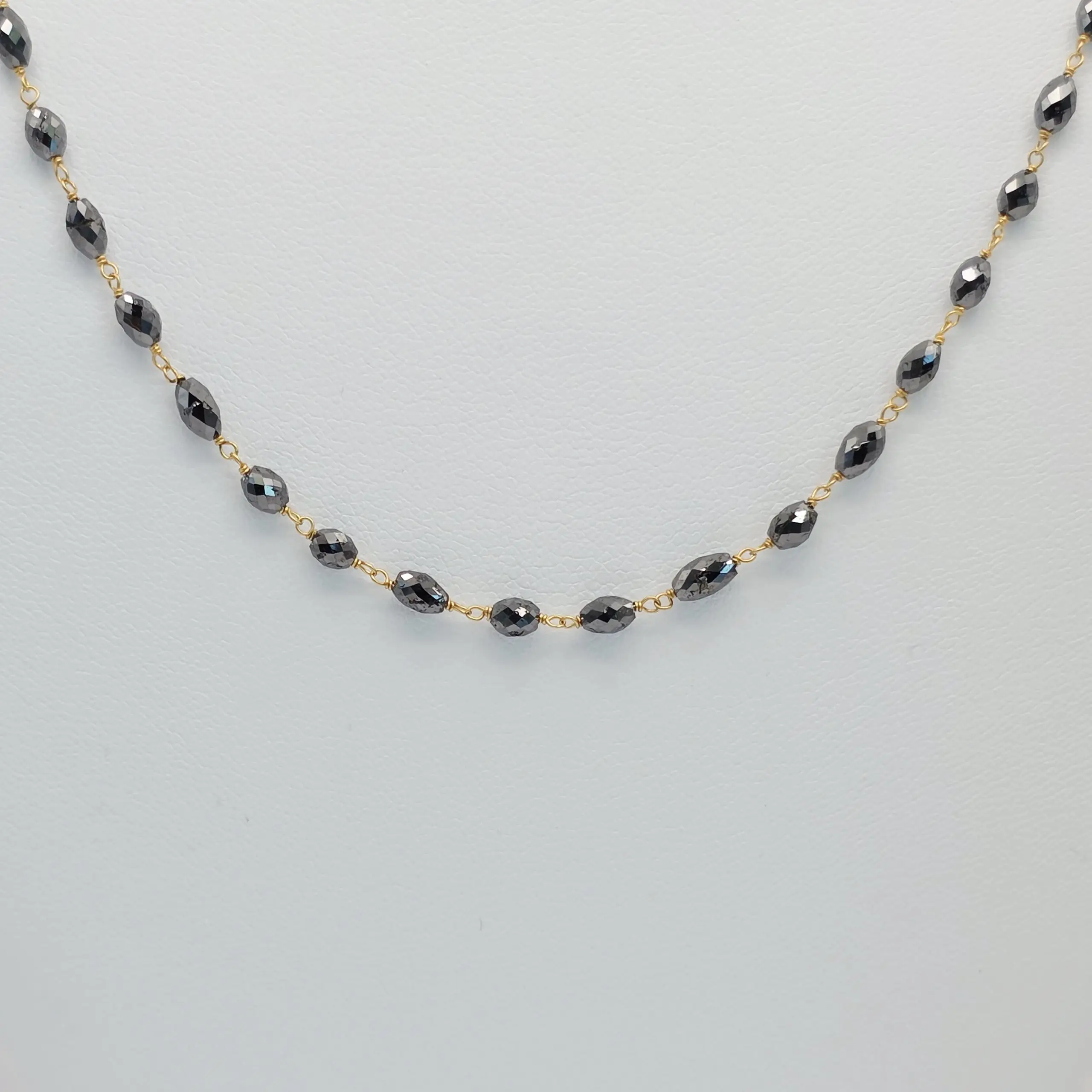 16.90 cts faceted natural black diamond marquise bead necklace in 14K yellow gold