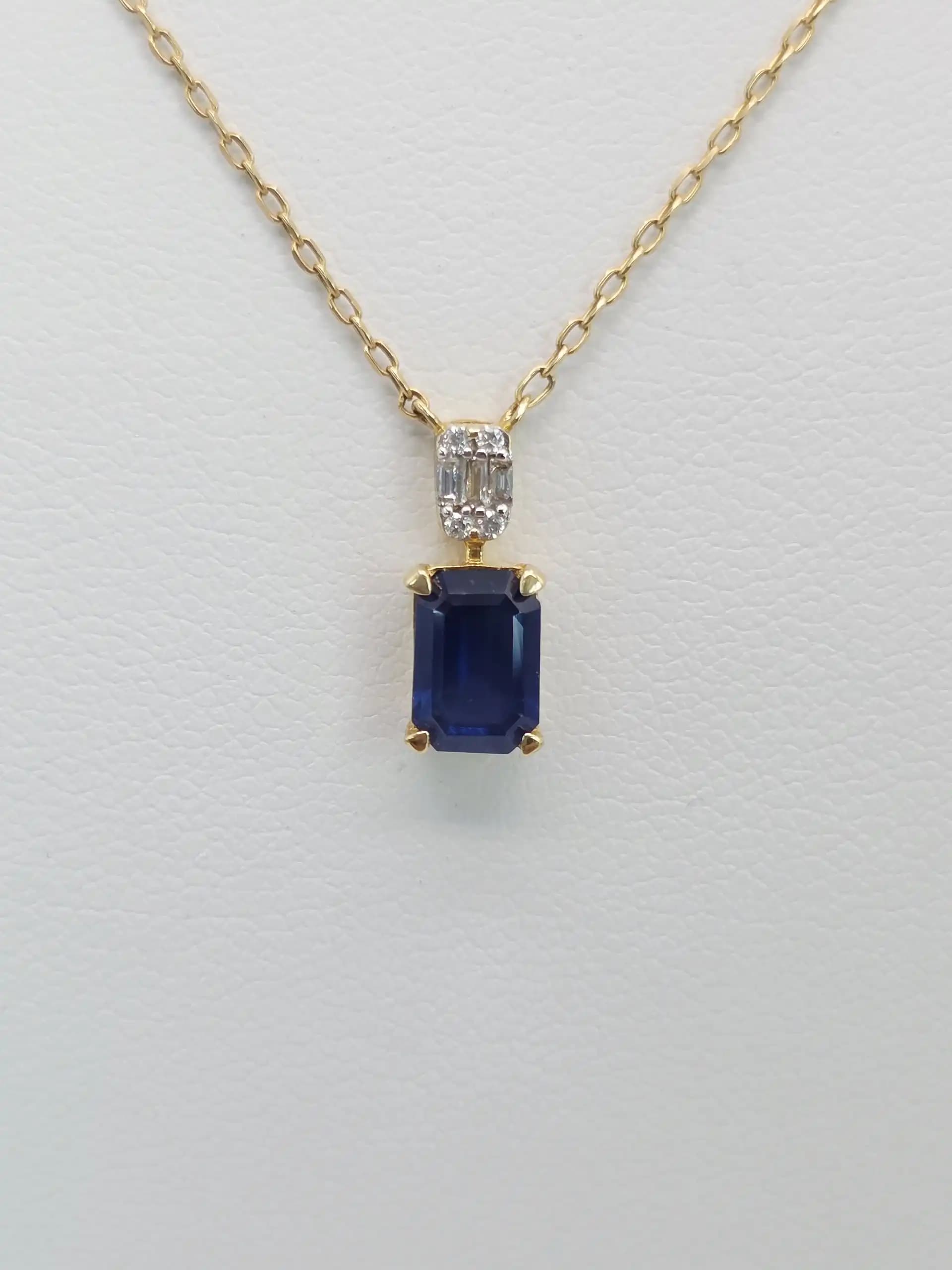 Blue Sapphire Pendent necklace with a Diamond Station Chain