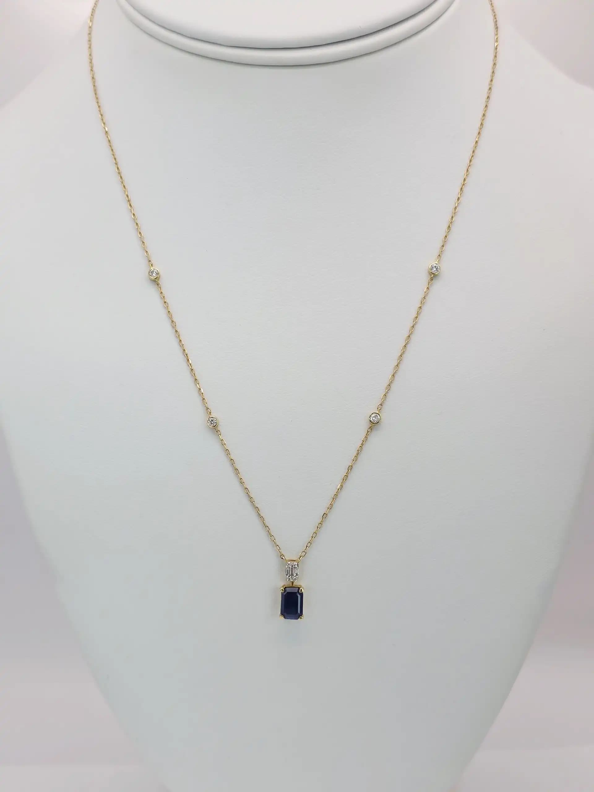 Blue Sapphire Pendent necklace with a Diamond Station Chain