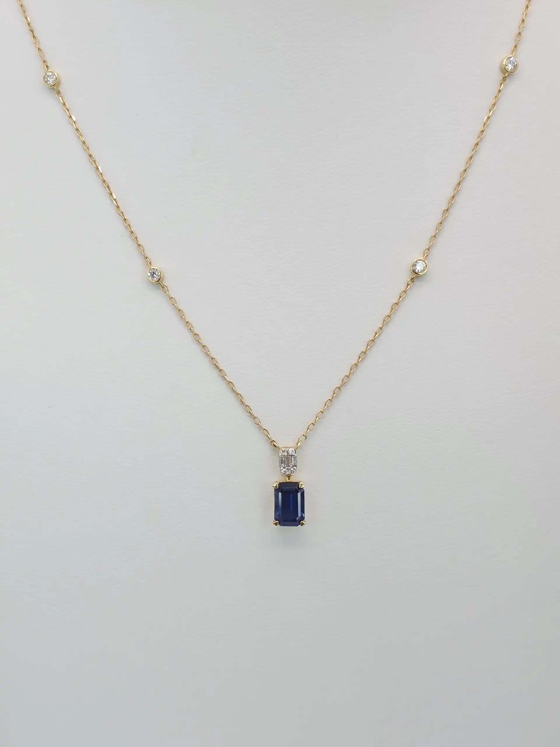Blue Sapphire Pendent necklace with a Diamond Station Chain