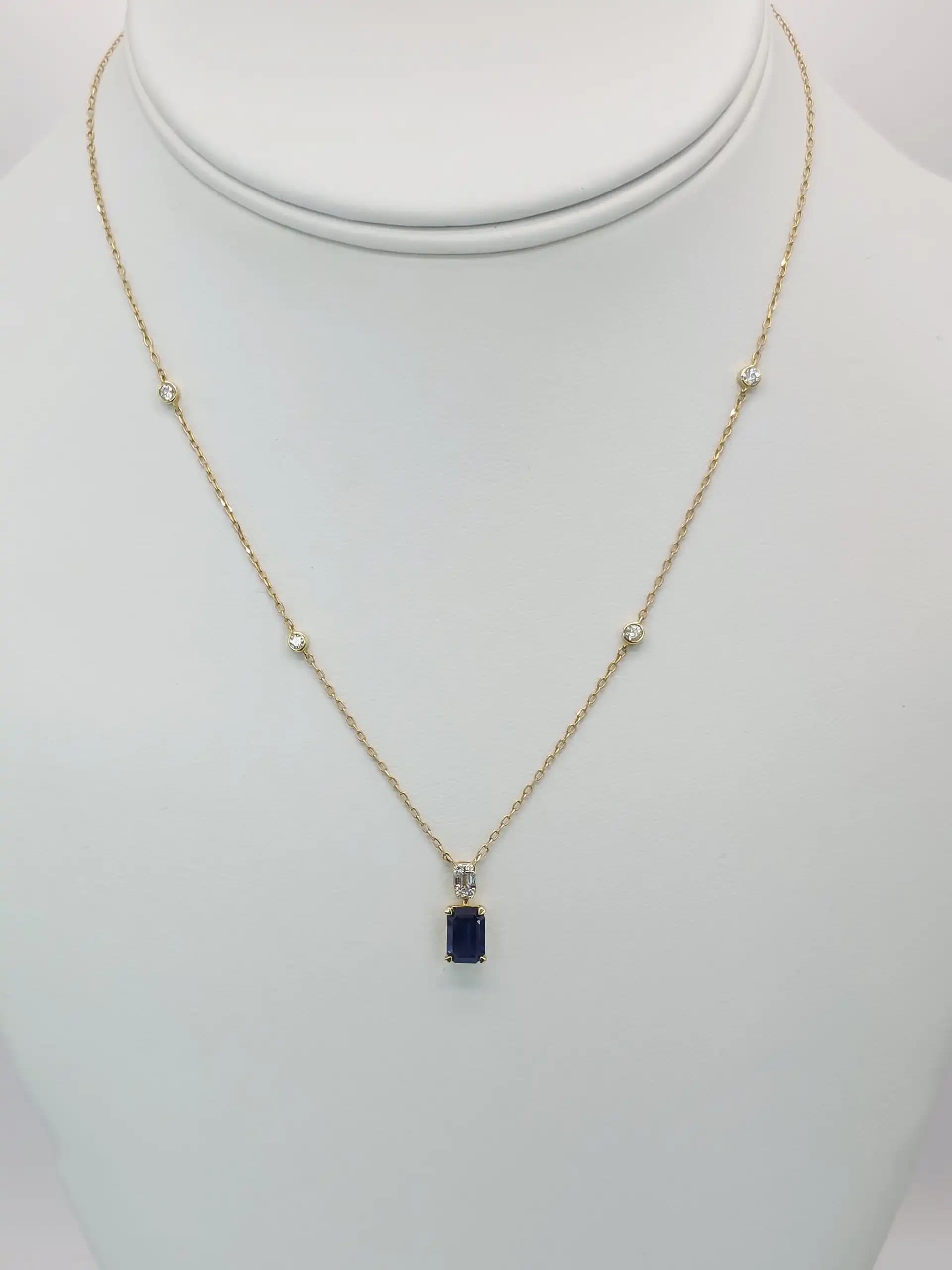 Blue Sapphire Pendent necklace with a Diamond Station Chain