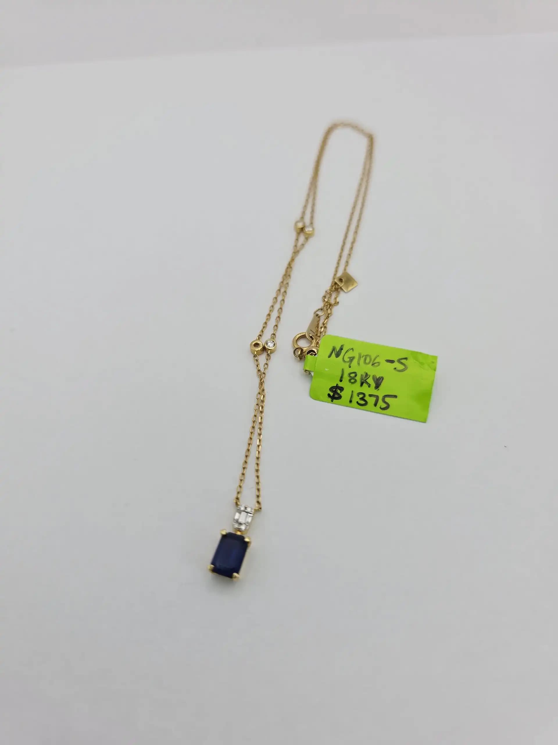 Blue Sapphire Pendent necklace with a Diamond Station Chain