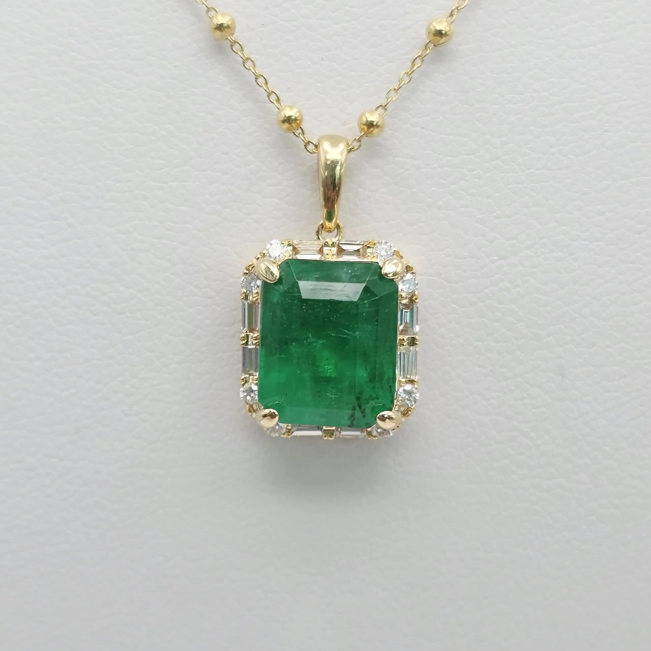 East-West Emerlad cut Solitaire Necklace