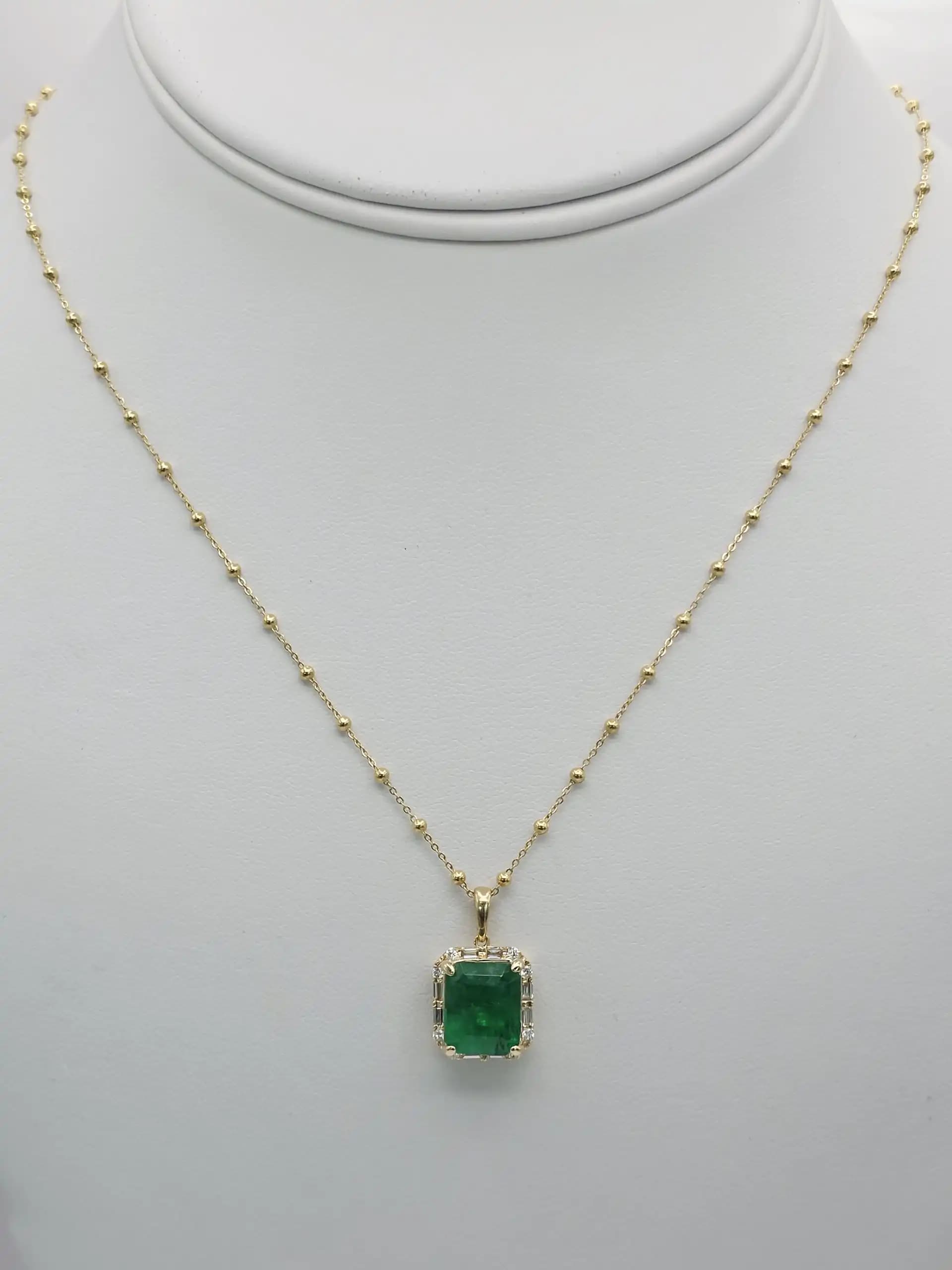 East-West Emerlad cut Solitaire Necklace