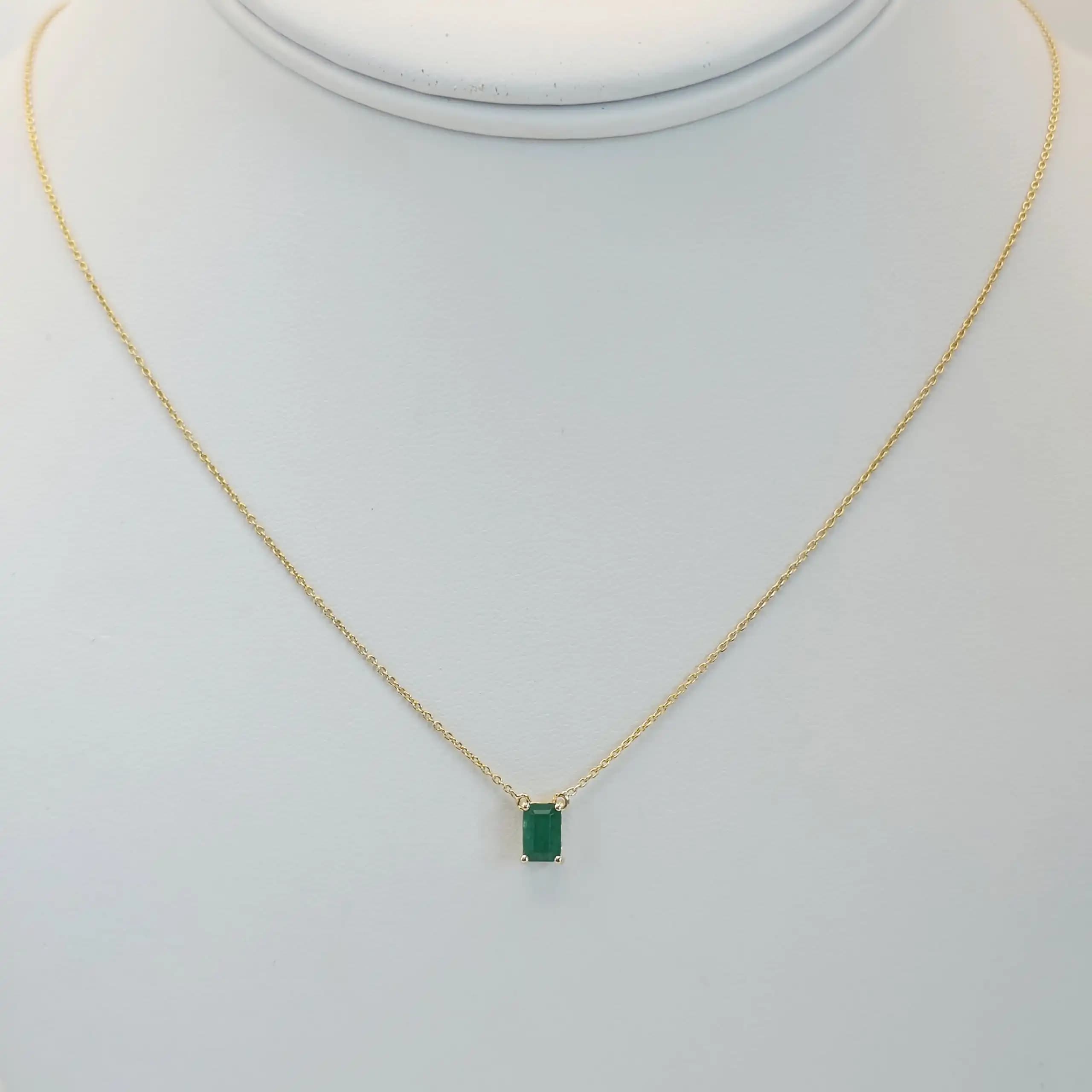 0.50 cts emerald cut natural emerald floating solitaire necklace in 14K yellow gold