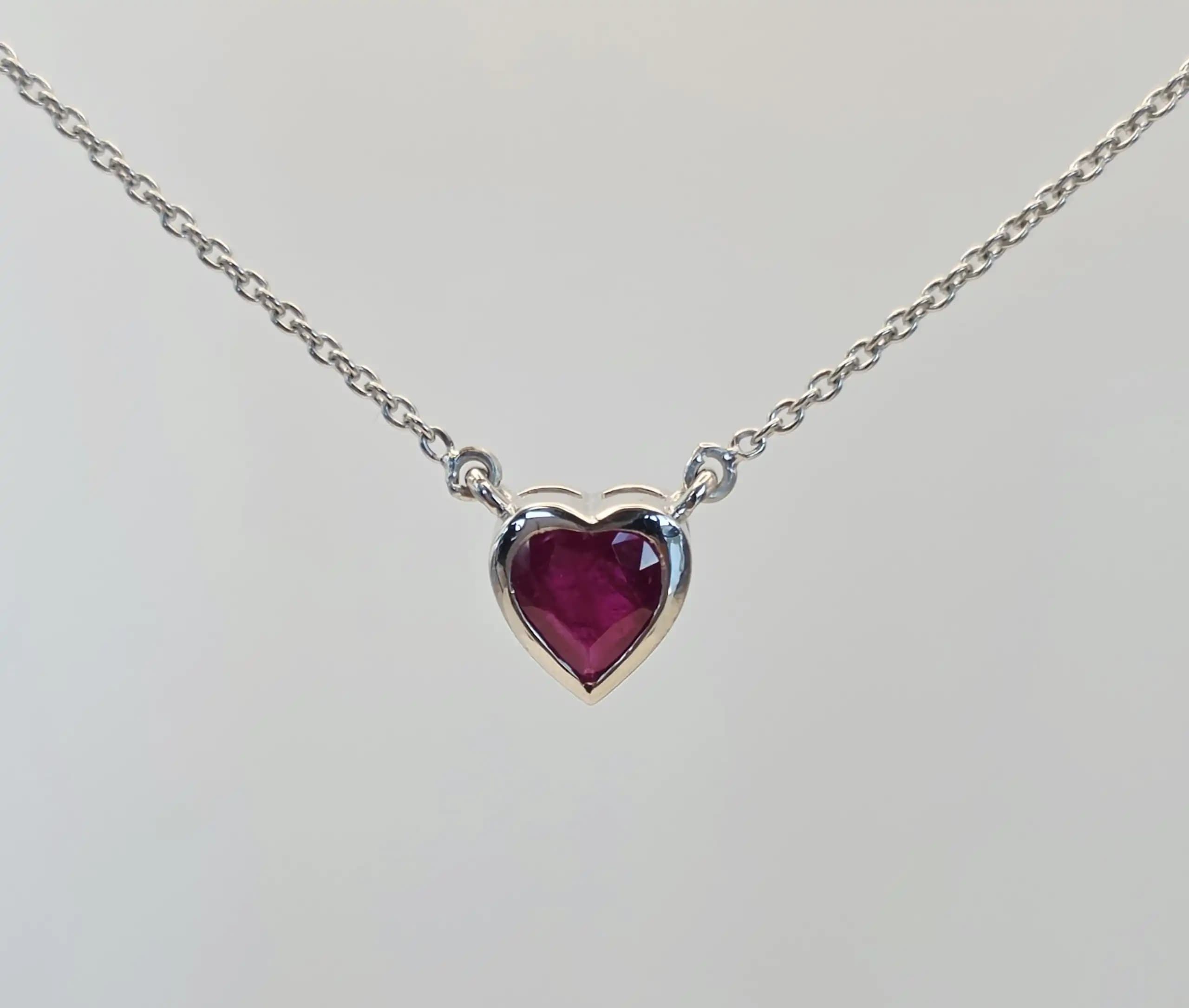 2.16 cts heart shape natural ruby bezel necklace in 14K white gold