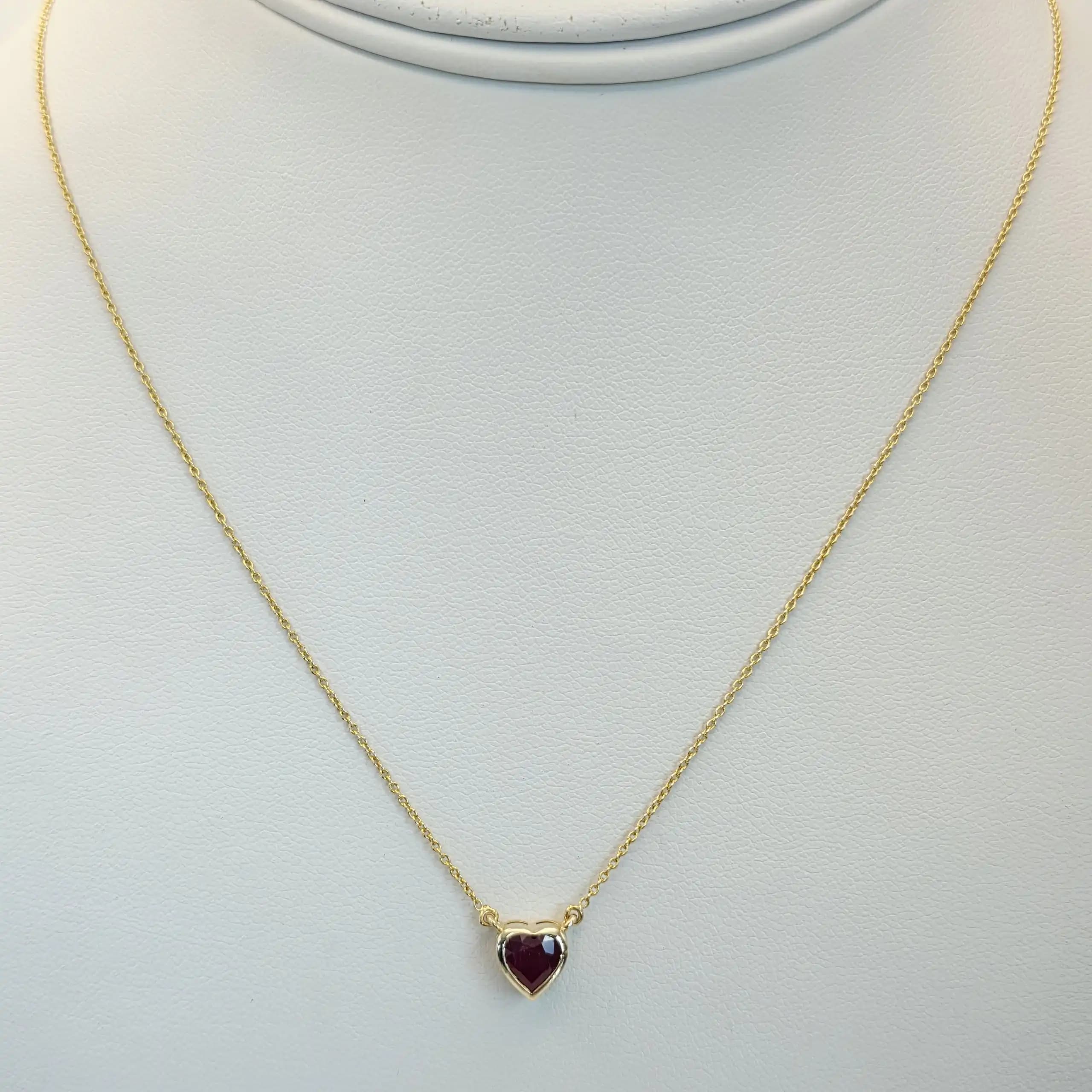 0.60 to 0.75 cts heart shape natural ruby bezel necklace in 14K yellow gold