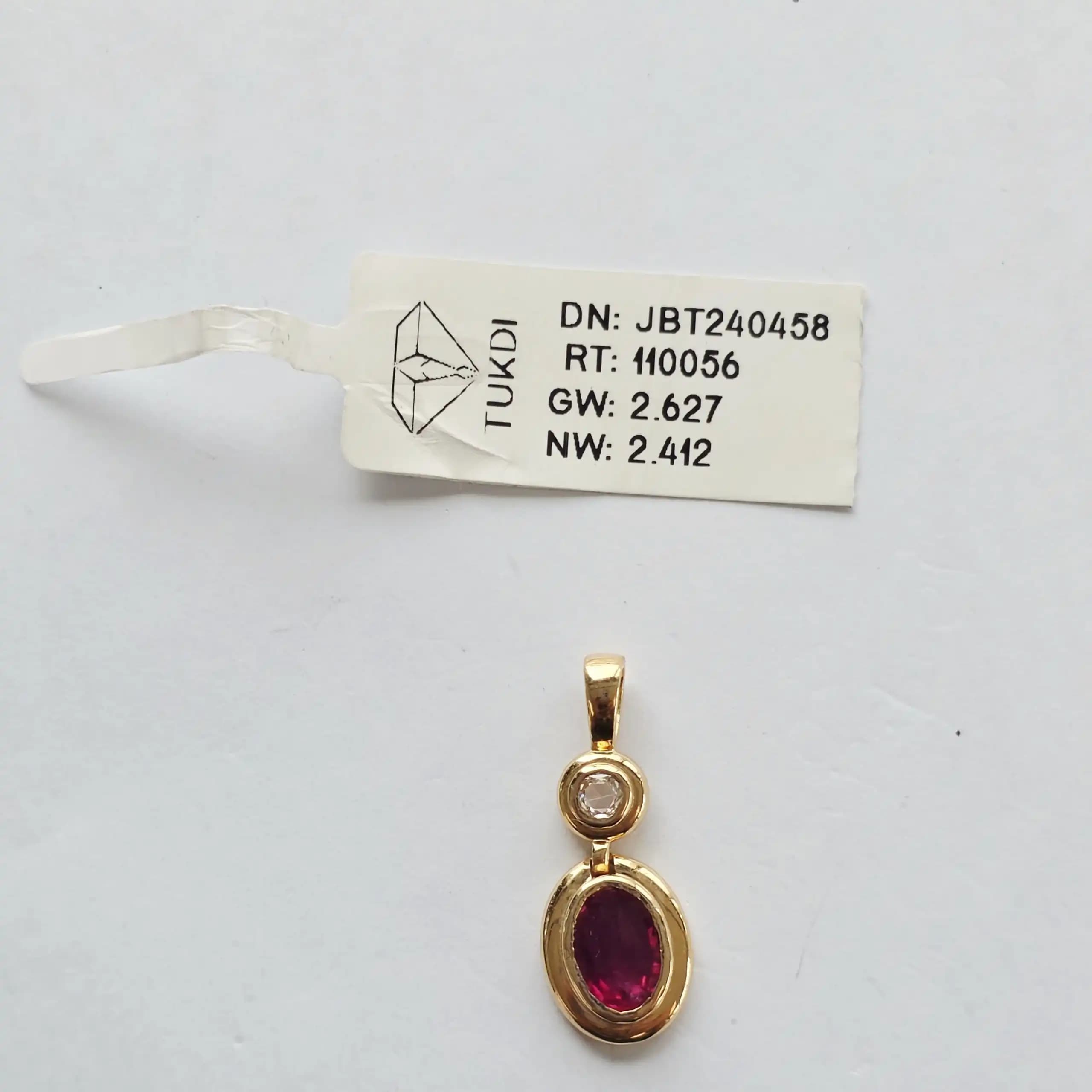 1.01 cts oval natural ruby and diamond drop pendant in 18K yellow gold
