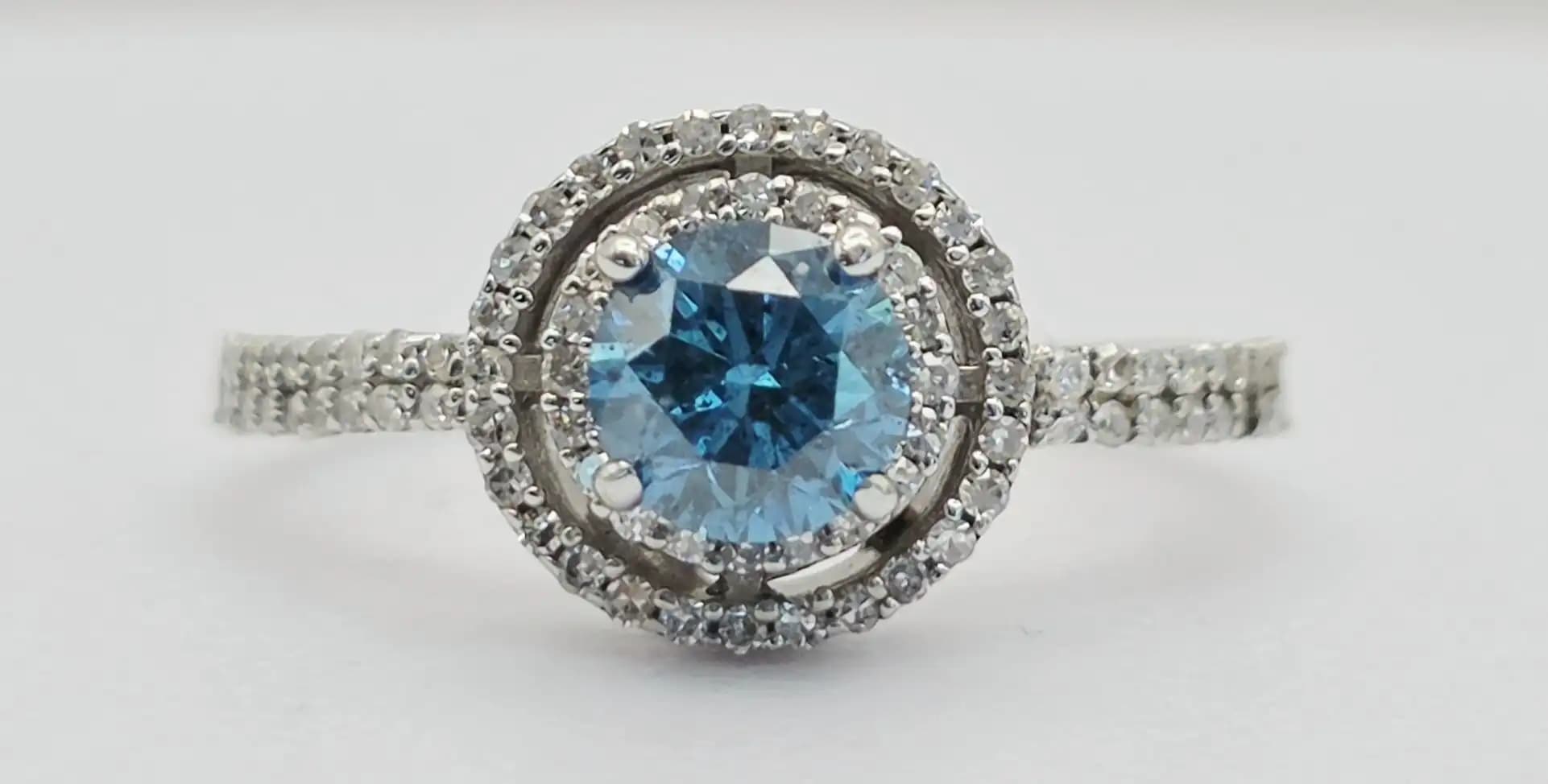 0.55 cts cushion natural blue gemstone and diamond halo ring in 14K white gold