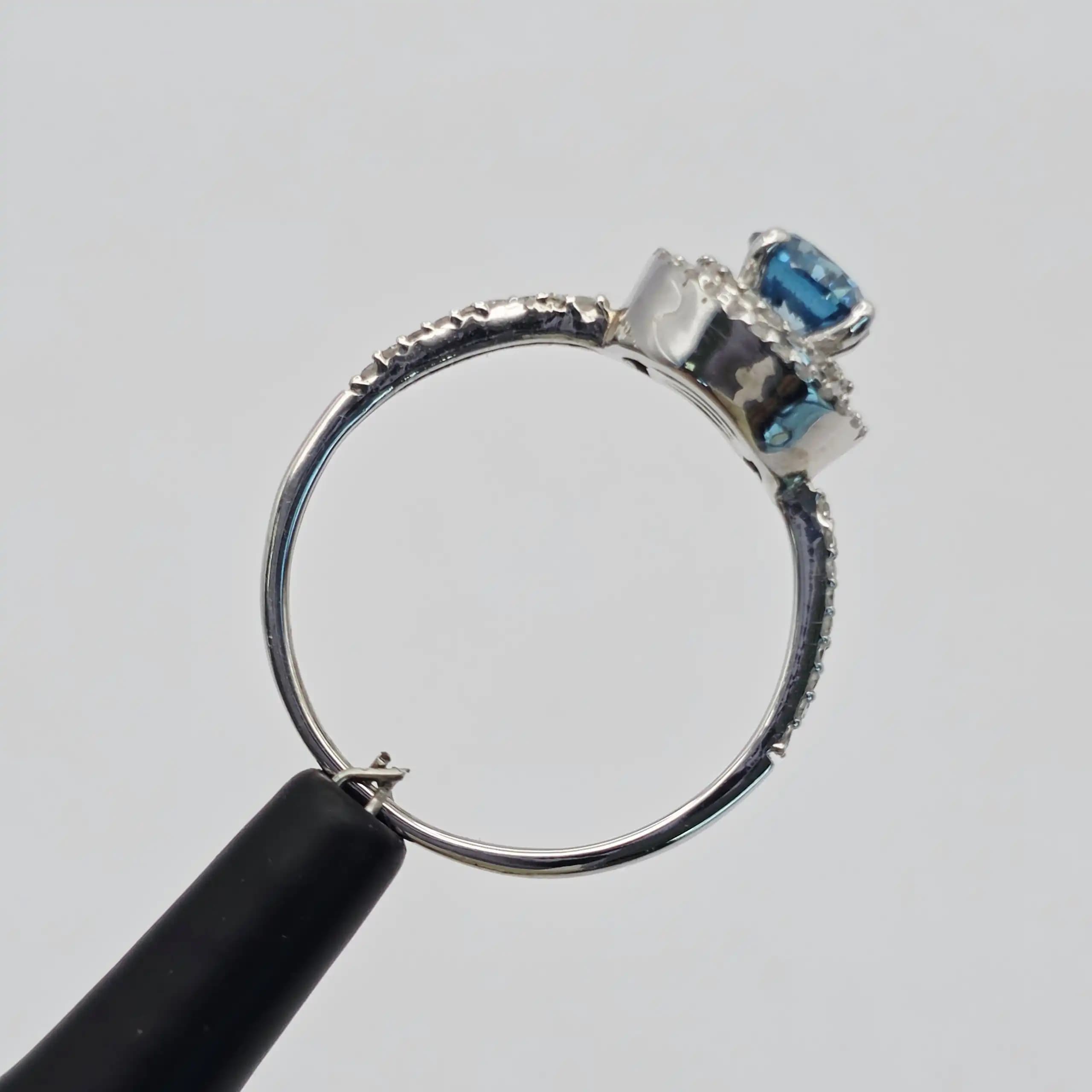 0.55 cts cushion natural blue gemstone and diamond halo ring in 14K white gold