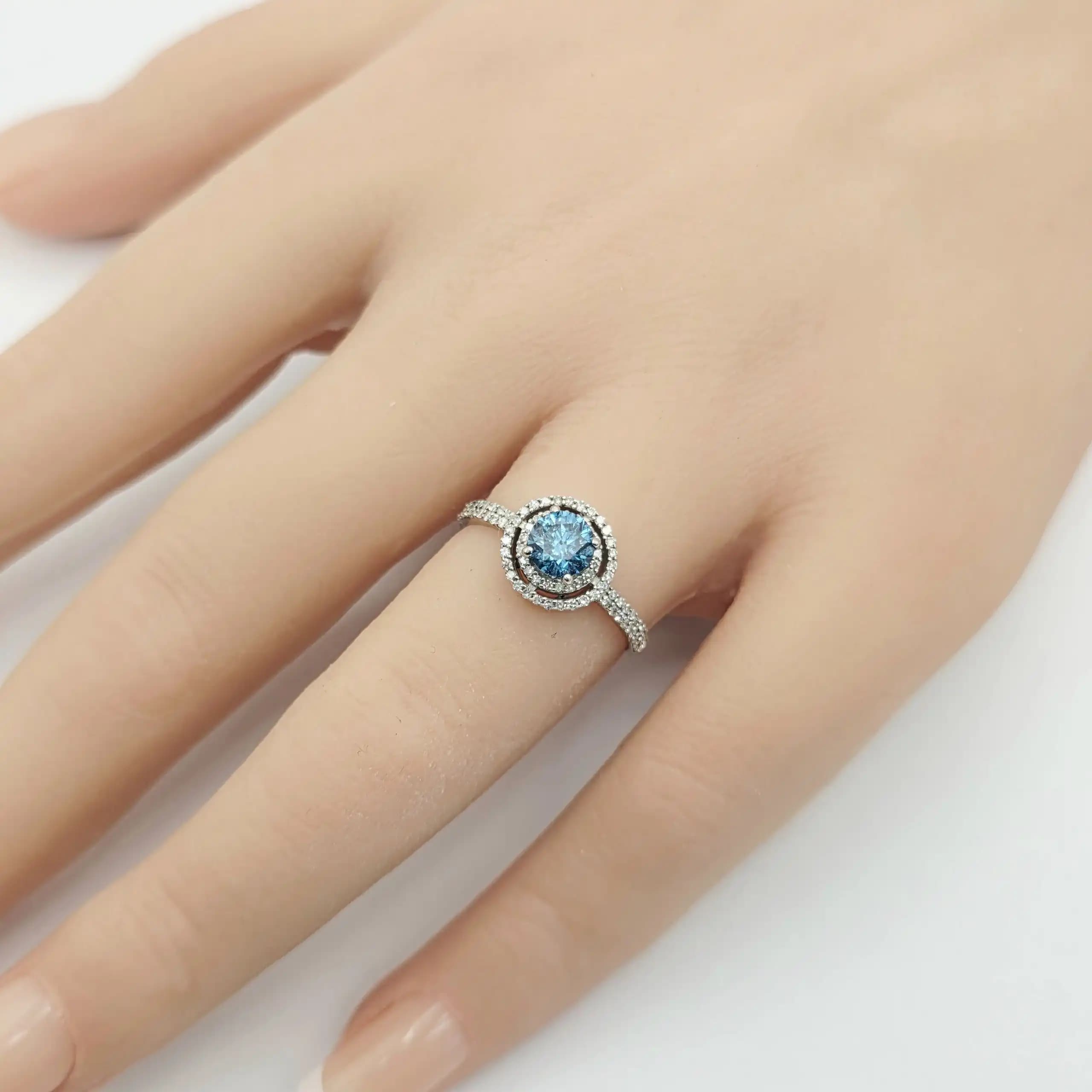 0.55 cts cushion natural blue gemstone and diamond halo ring in 14K white gold