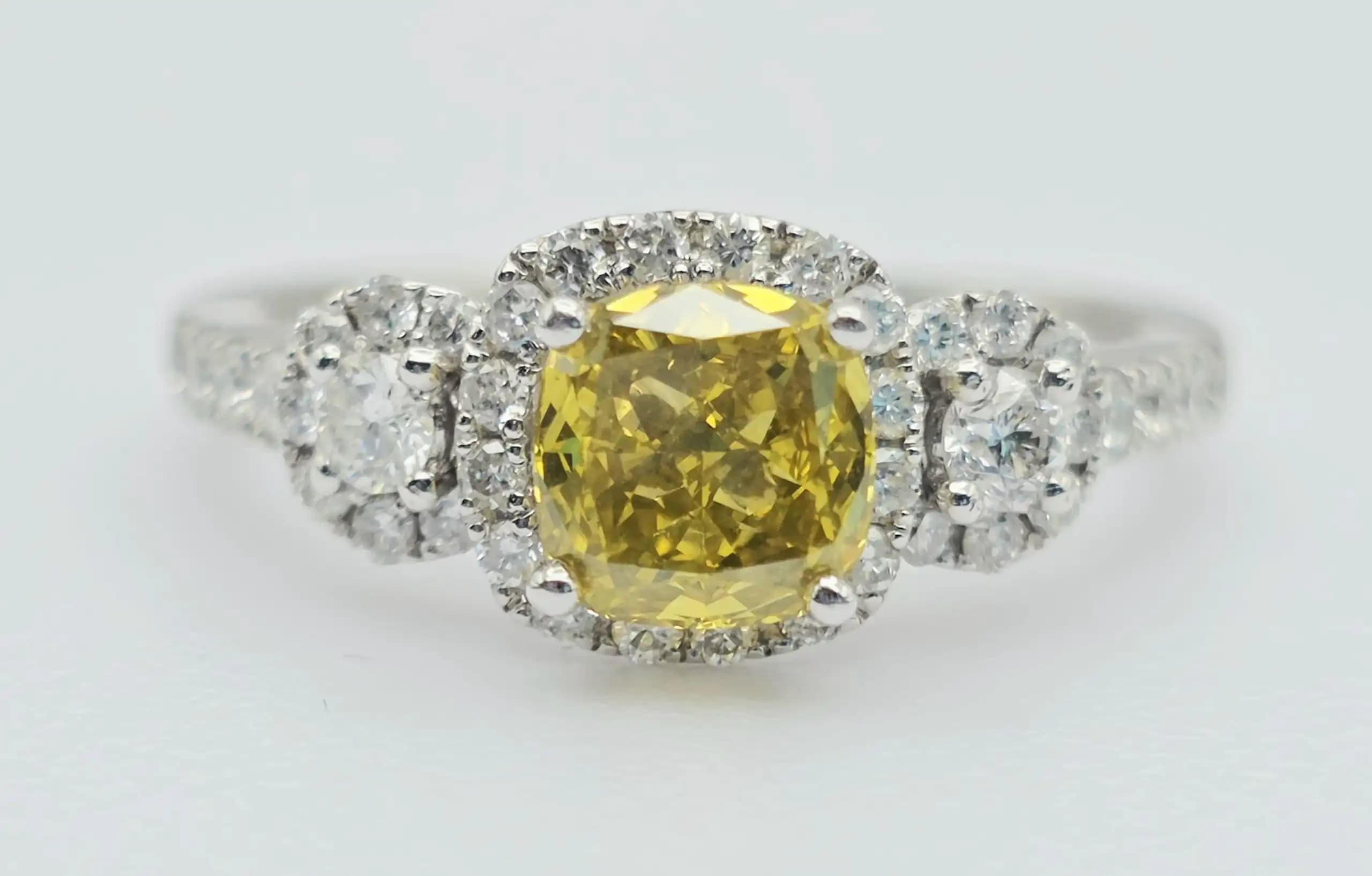 1.01 cts cushion natural fancy yellow diamond halo ring in 14K white gold