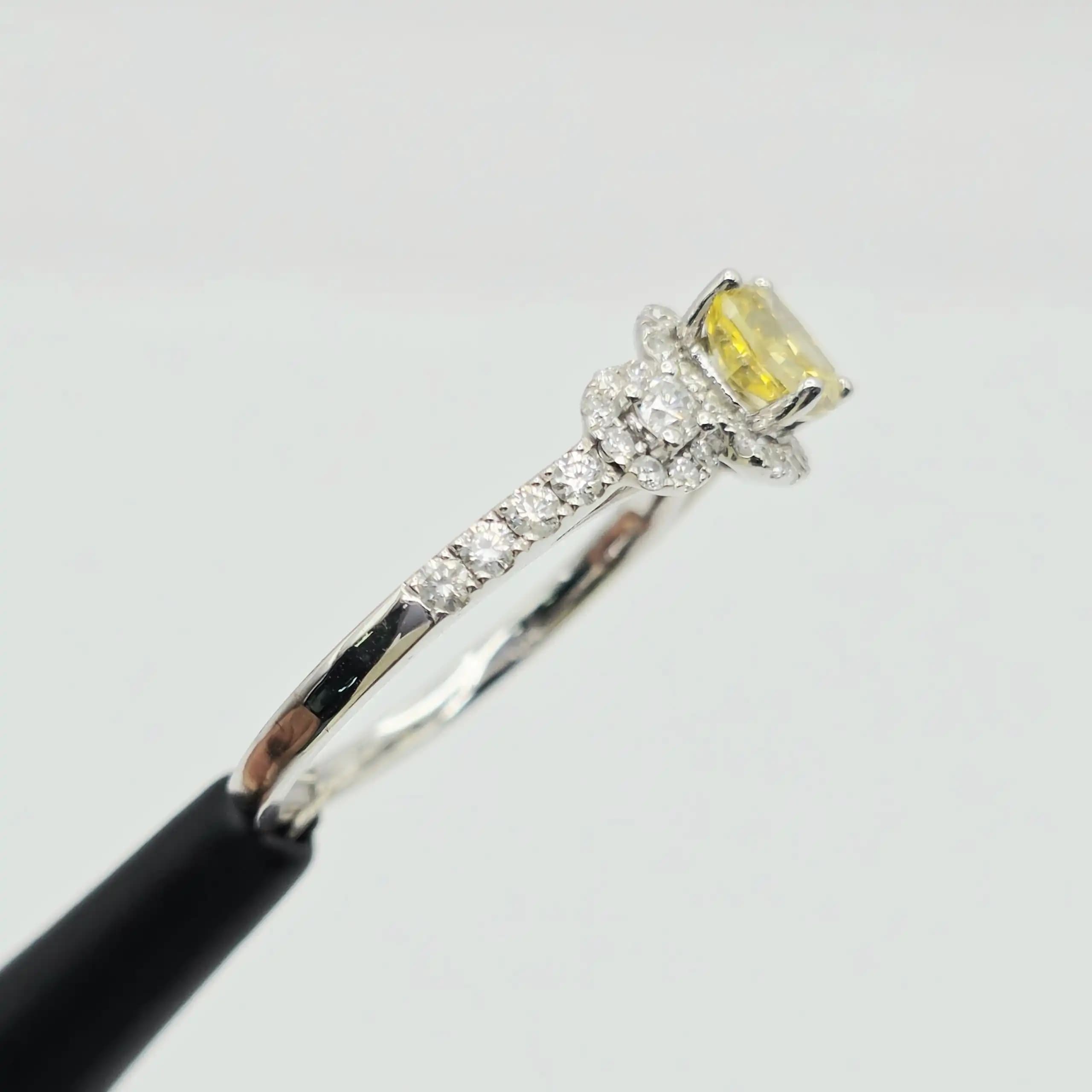 1.01 cts cushion natural fancy yellow diamond halo ring in 14K white gold