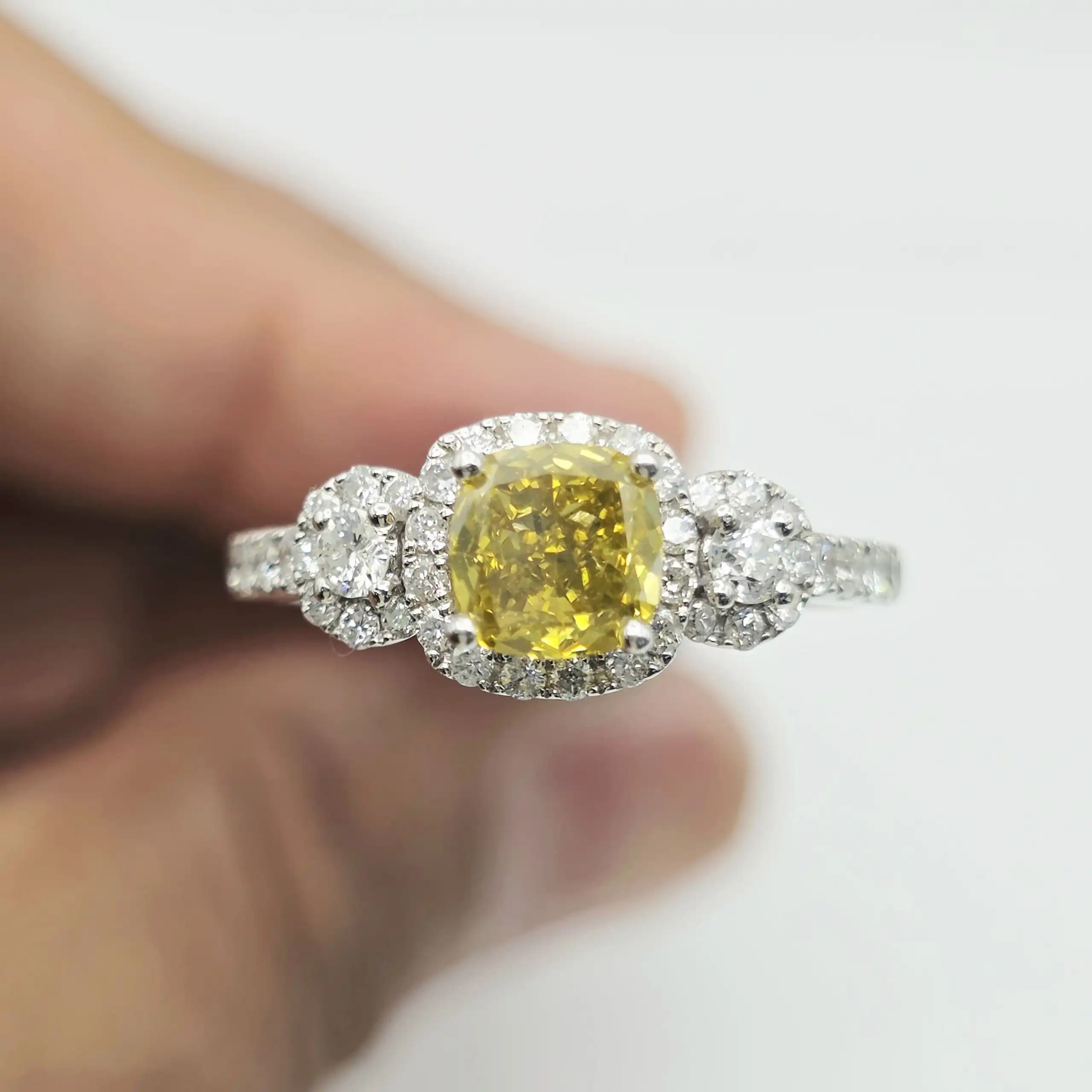 1.01 cts cushion natural fancy yellow diamond halo ring in 14K white gold