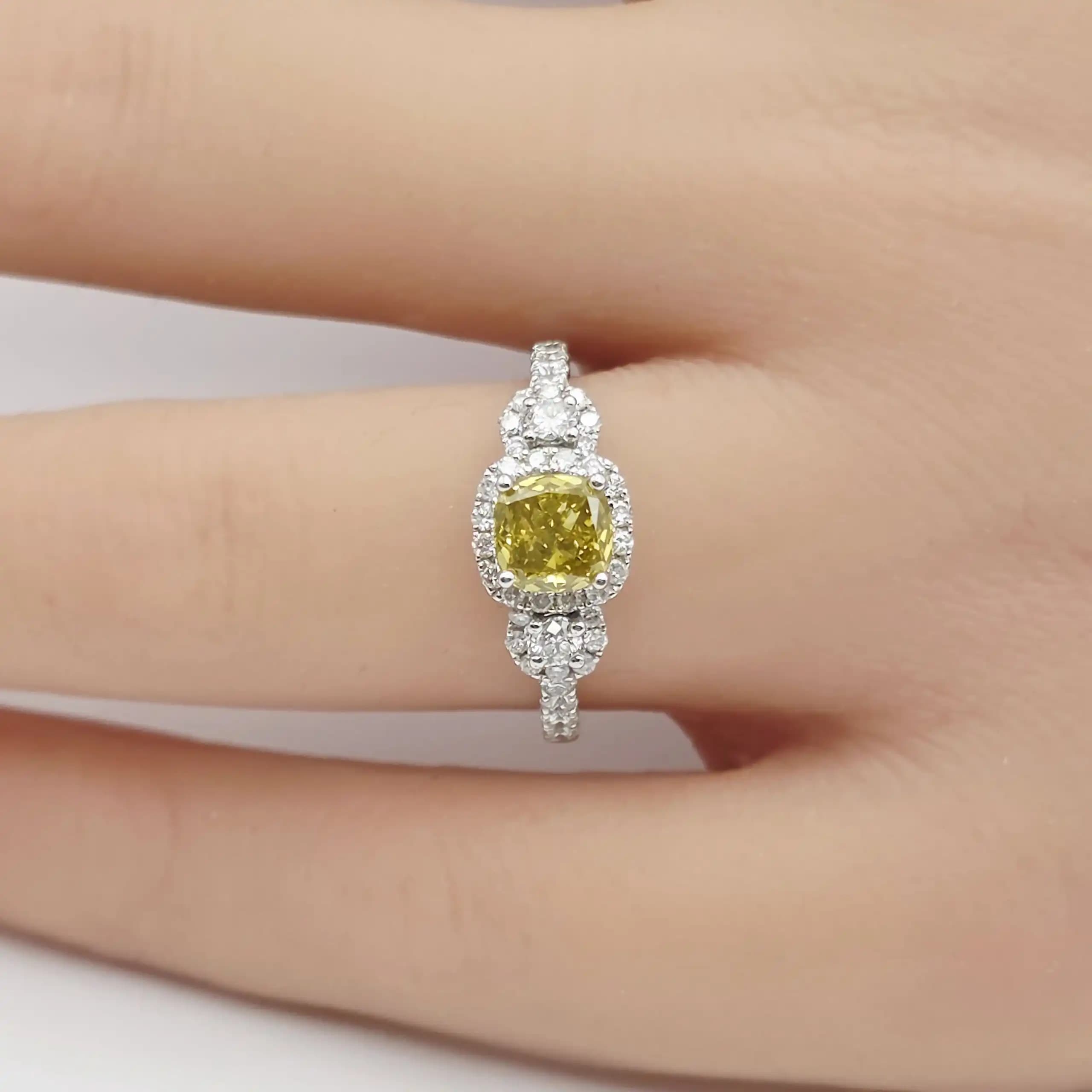 1.01 cts cushion natural fancy yellow diamond halo ring in 14K white gold