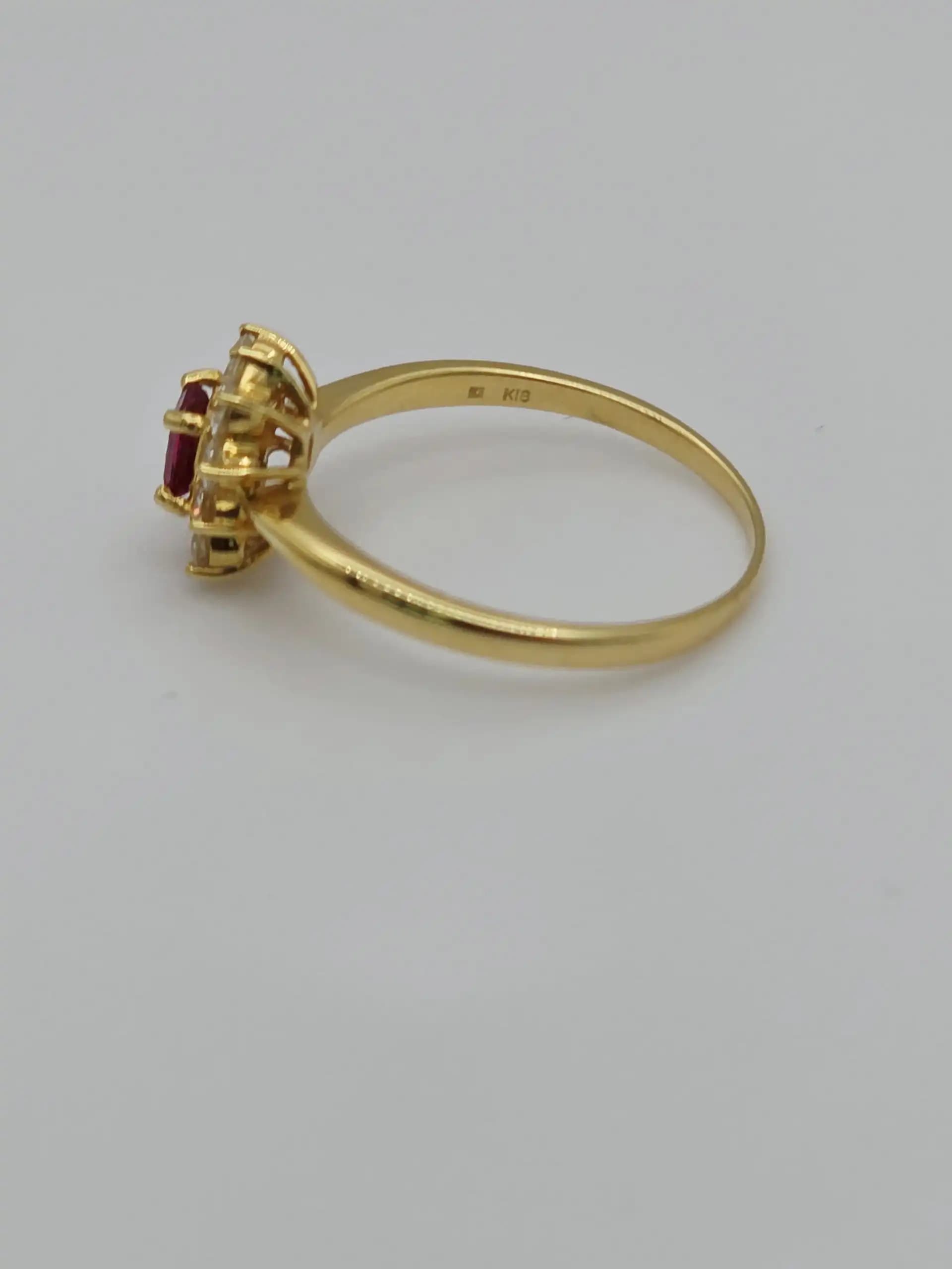 0.27 cts marquise natural ruby and diamond cluster ring in 18K yellow gold