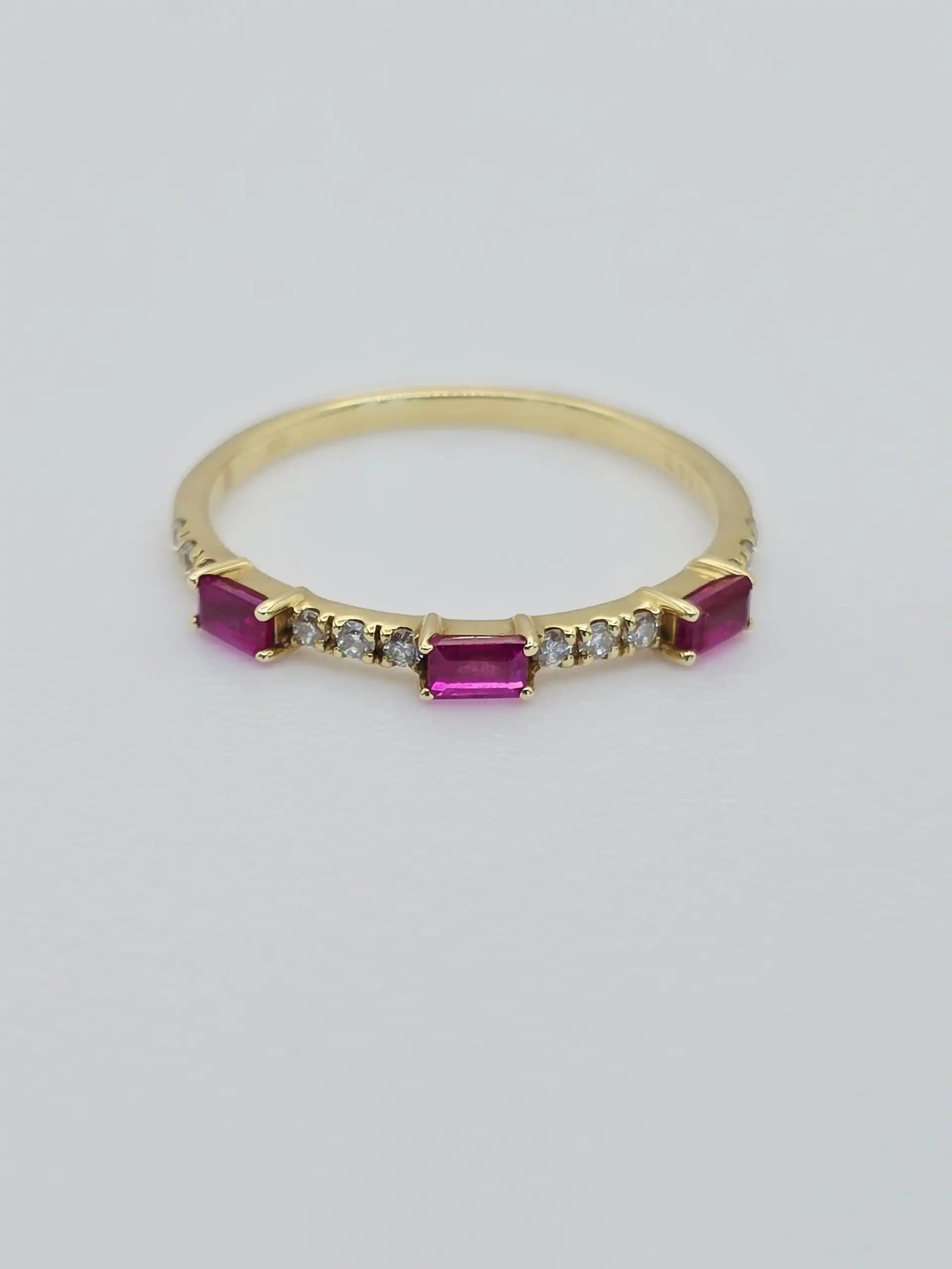 0.30 cts emerald cut natural ruby and diamond band ring in 18K yellow gold