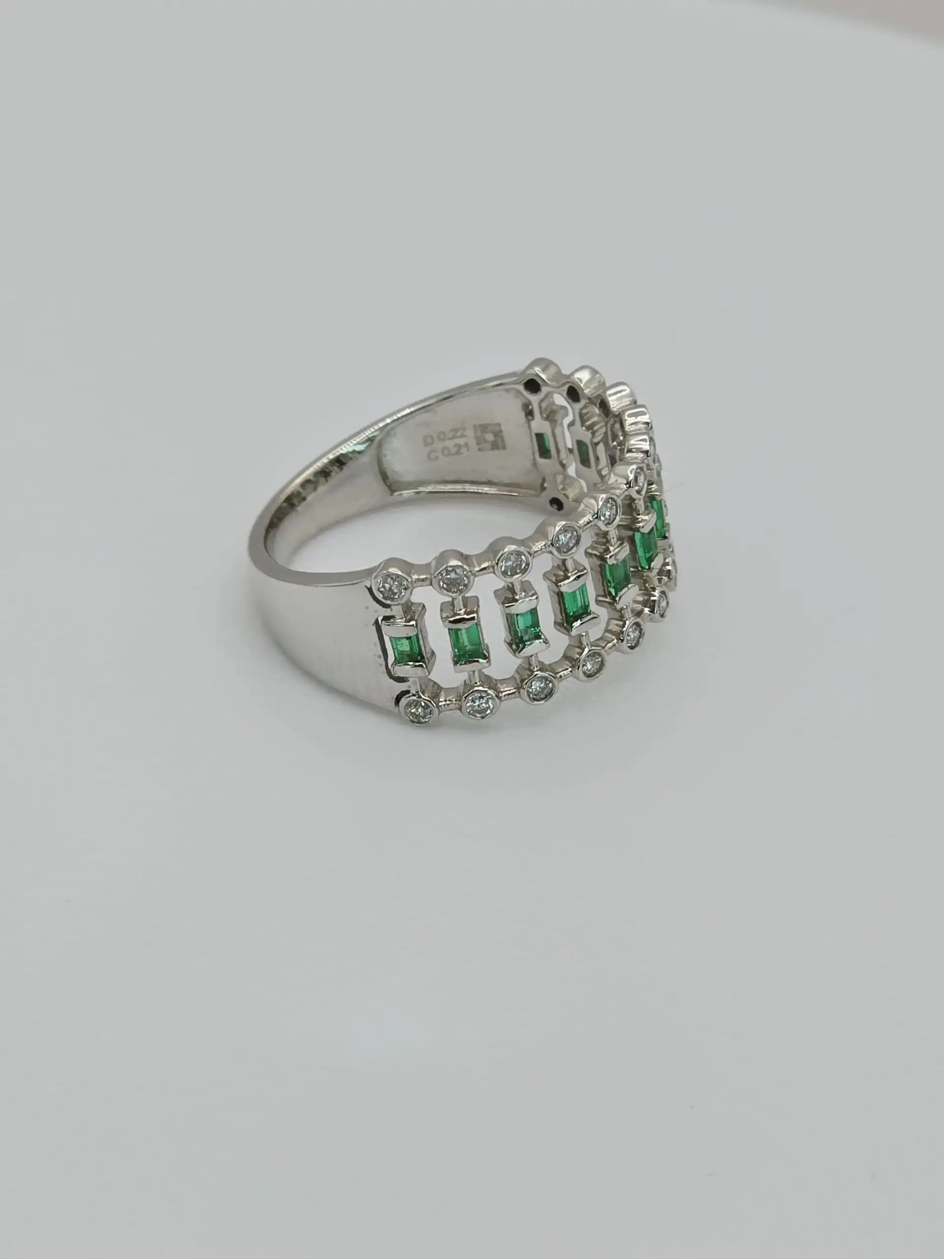 0.21 cts natural emerald and diamond wide band ring in 18K white gold