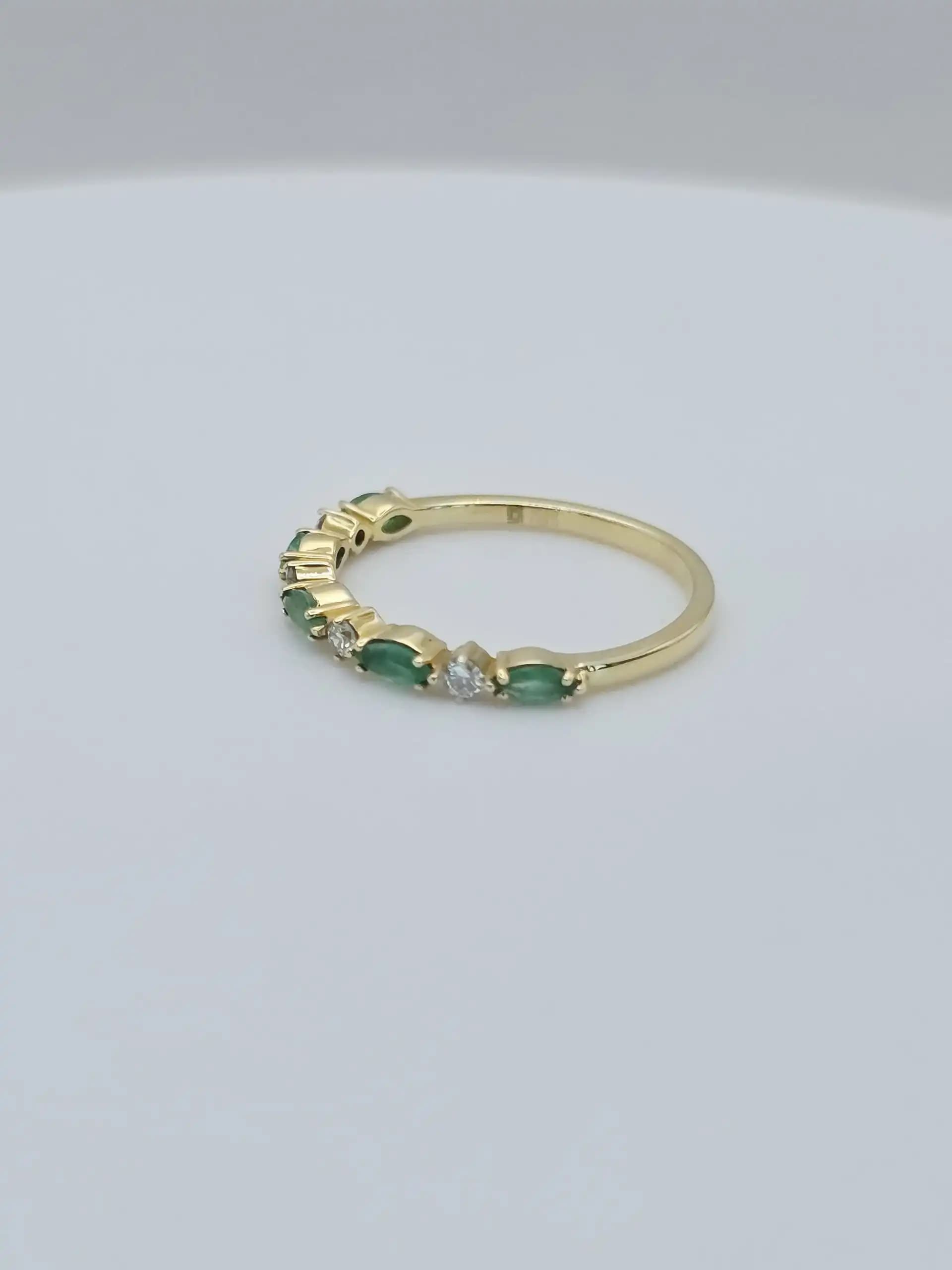 0.37 cts oval natural emerald and diamond band ring in 18K yellow gold