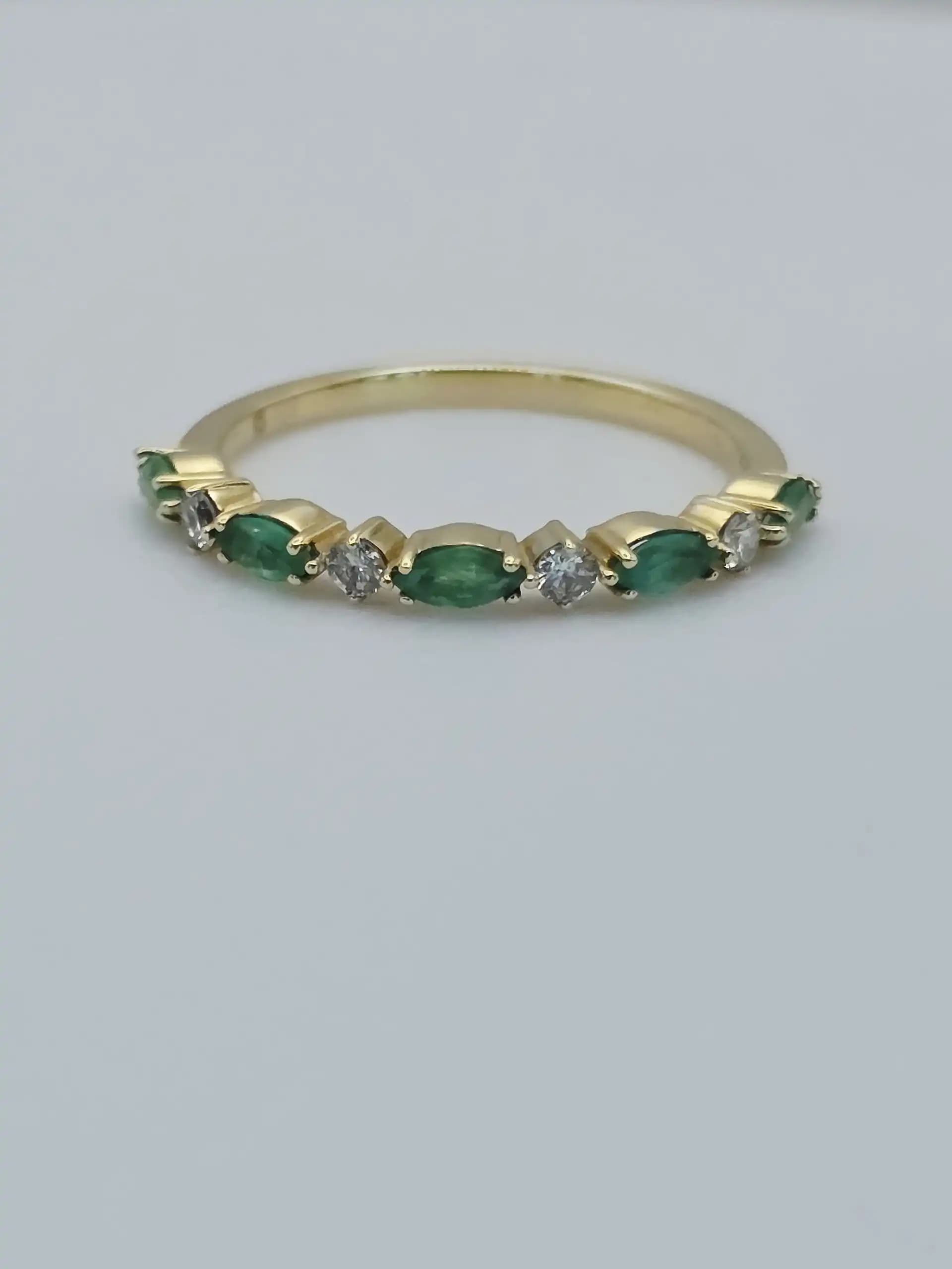 0.37 cts oval natural emerald and diamond band ring in 18K yellow gold
