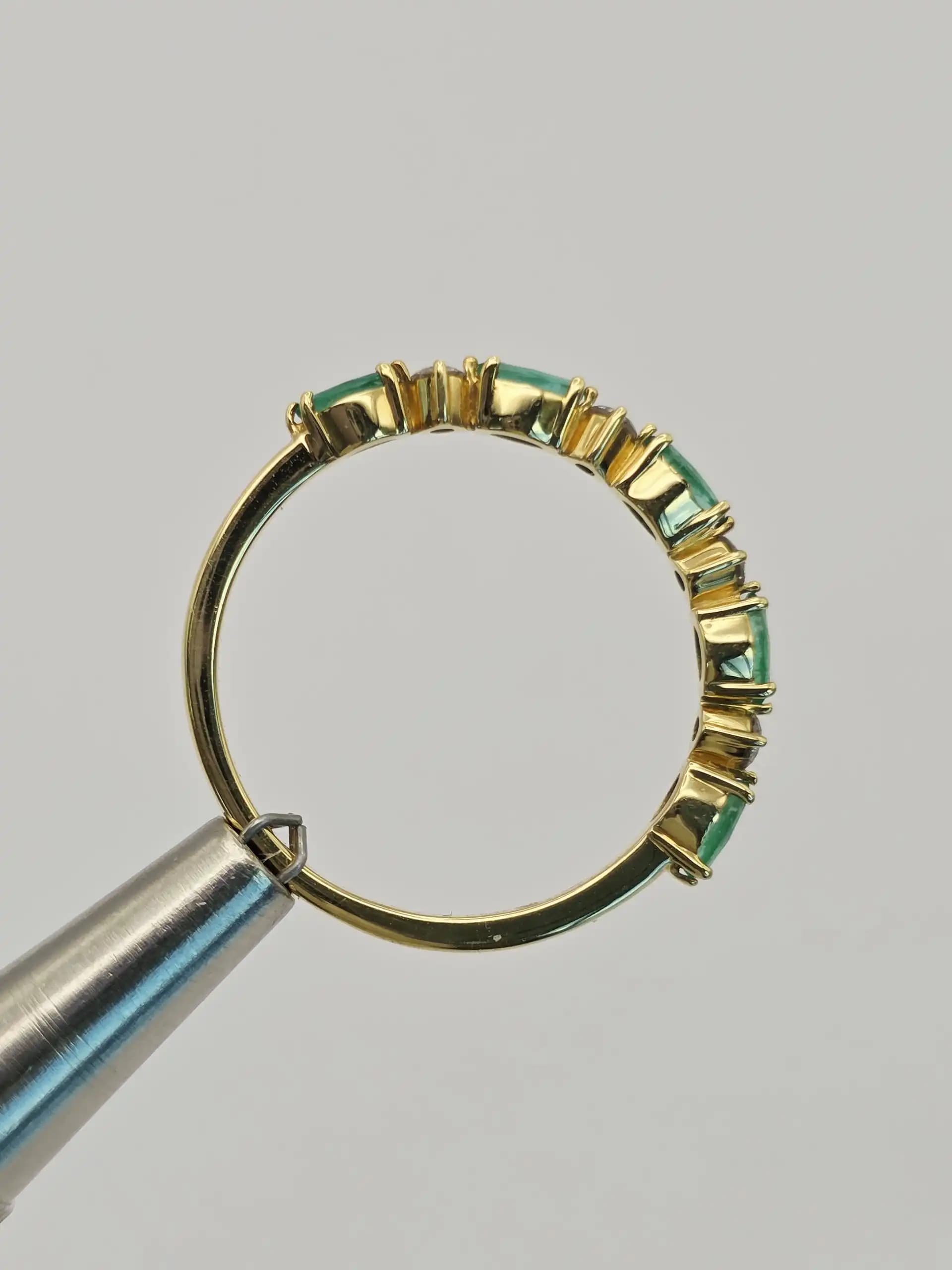 0.37 cts oval natural emerald and diamond band ring in 18K yellow gold