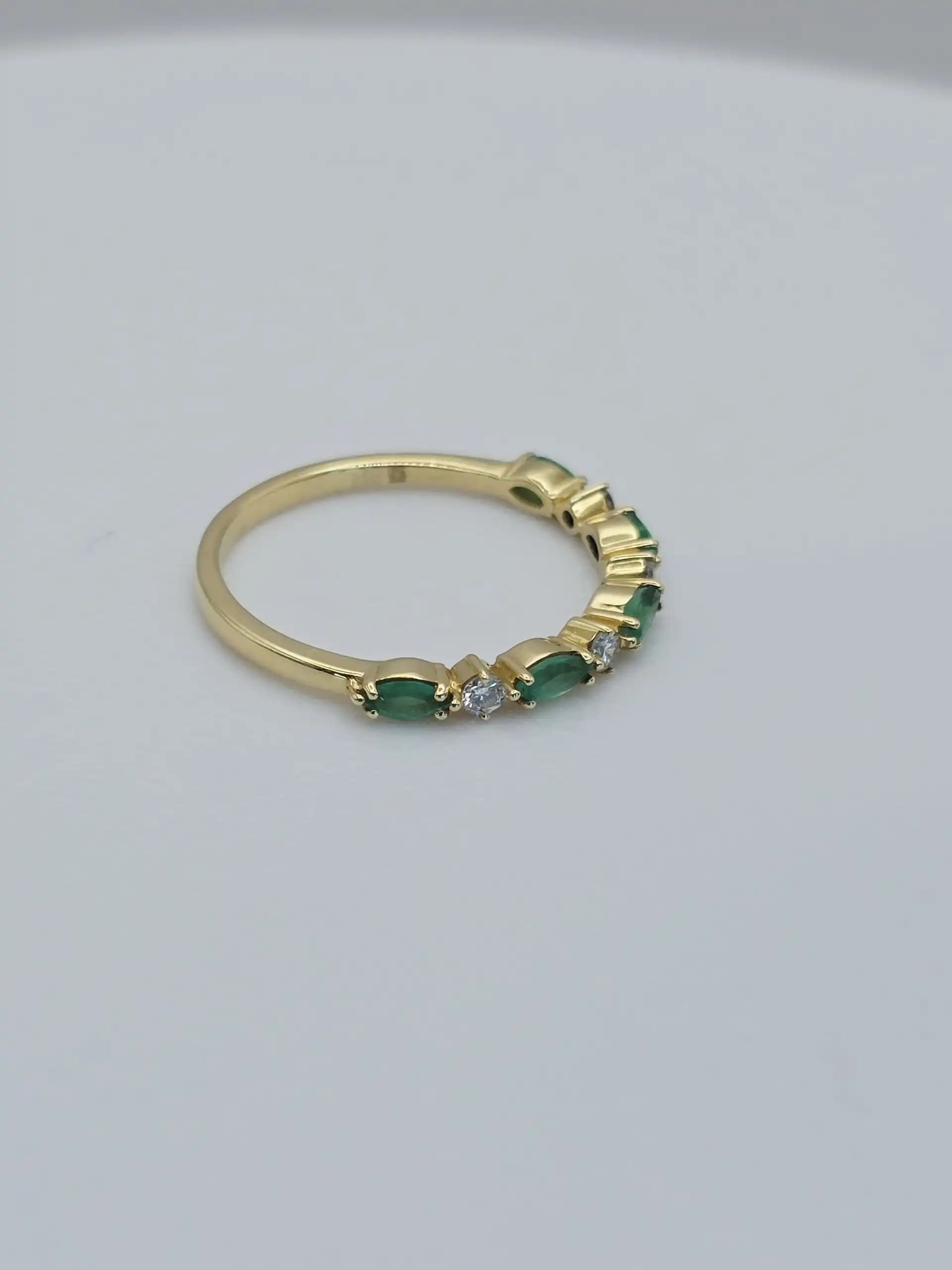 0.37 cts oval natural emerald and diamond band ring in 18K yellow gold